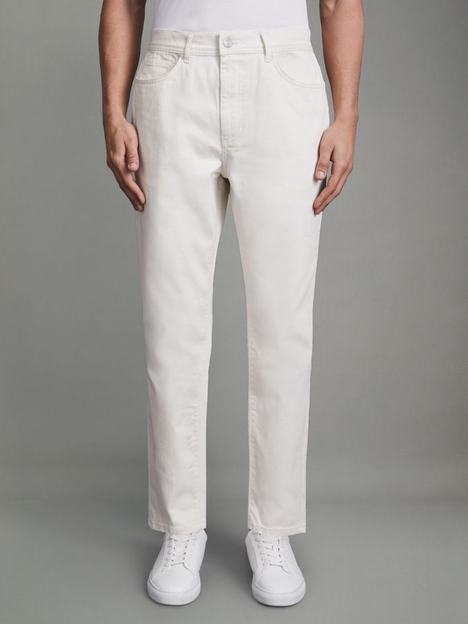 Nonchalkleurige taps toelopende jeans in ecru (374948) | € 67