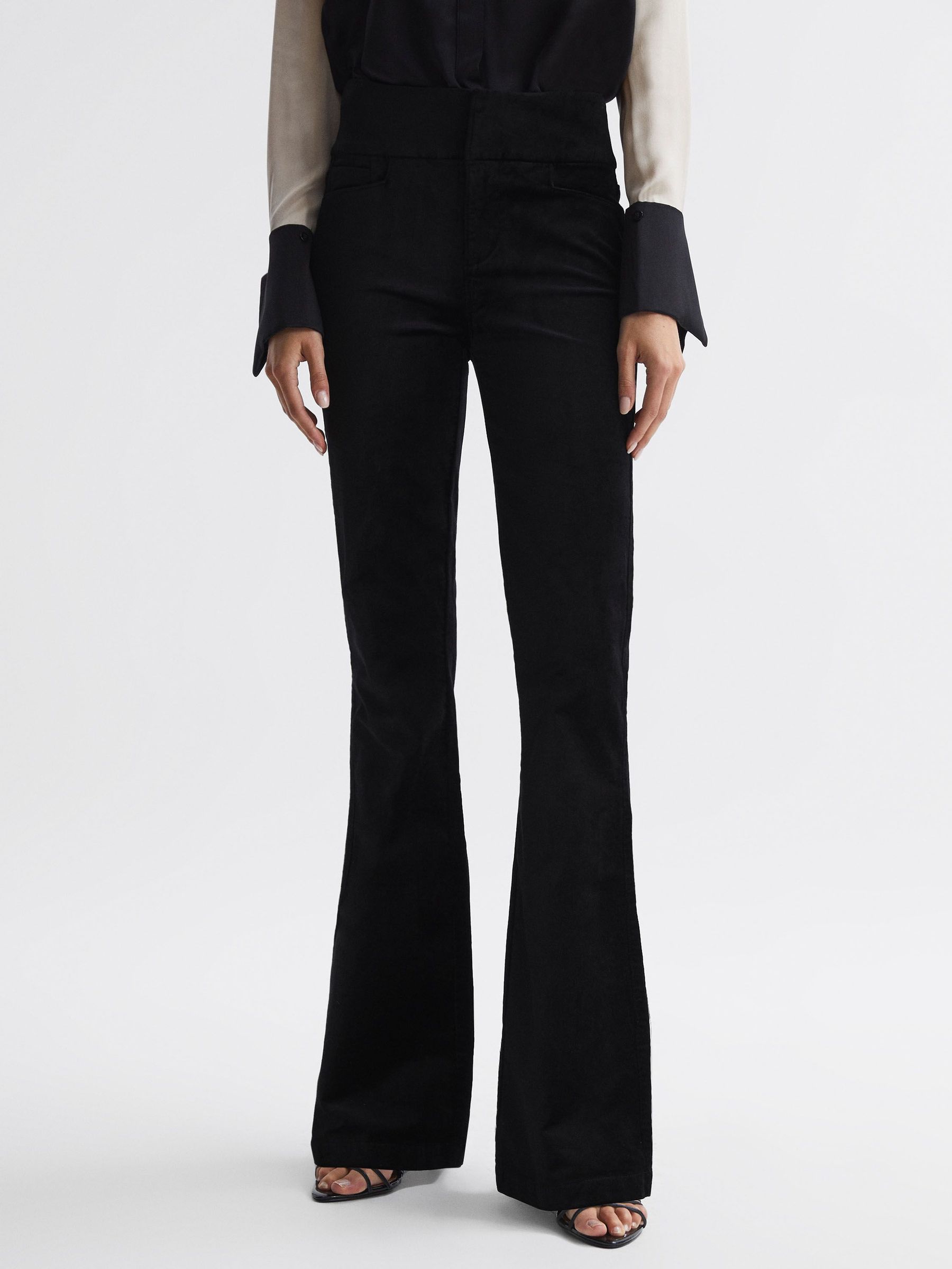 Paige Velvet Flared High Rise Jeans in Black (694727) | €197 - €279