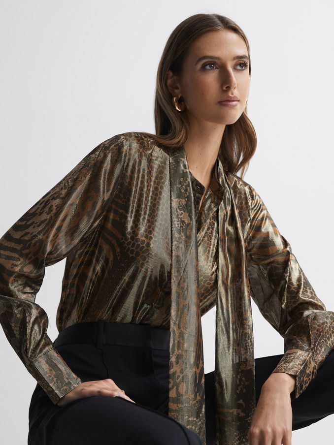 Metallic Animal Print Tie Neck Blouse in Gold (970463) | US$93