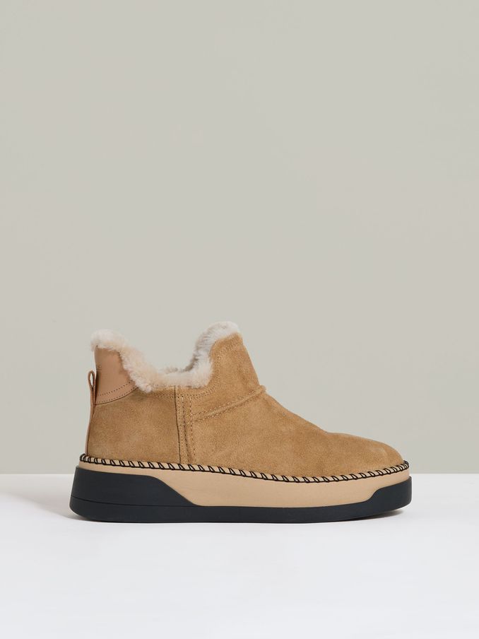 Shearling-Lined Suede Ankle Boots in Tan (AA1963) | US$166