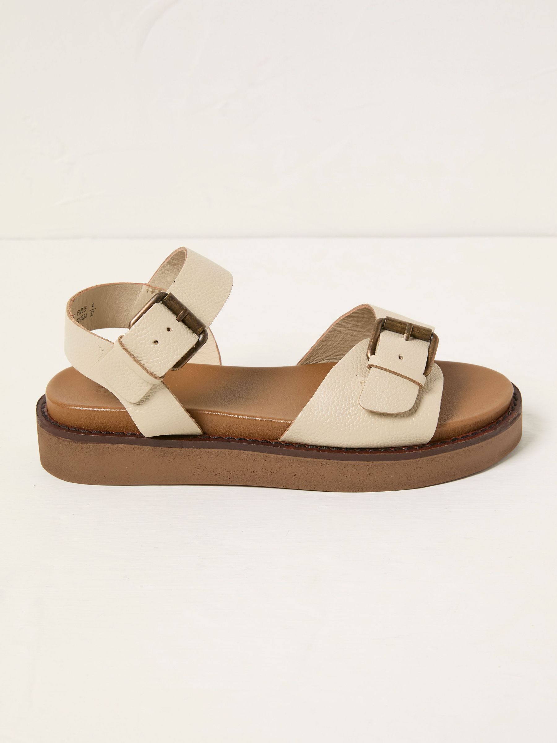 Ambie Ivory Buckle Sandal (AB1057) | $103