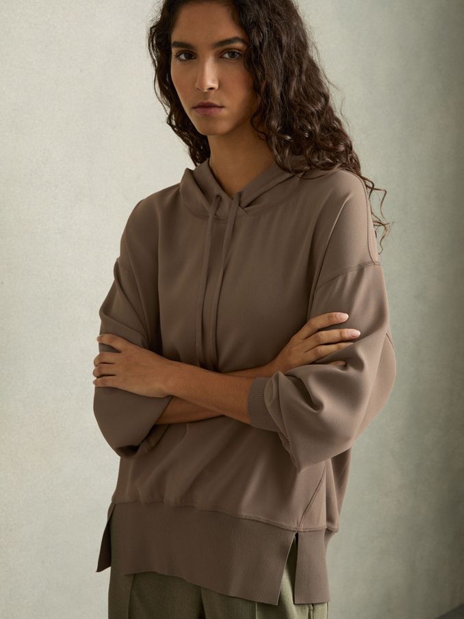 Geweven lichtbruine top met capuchon (AB2430) | € 134