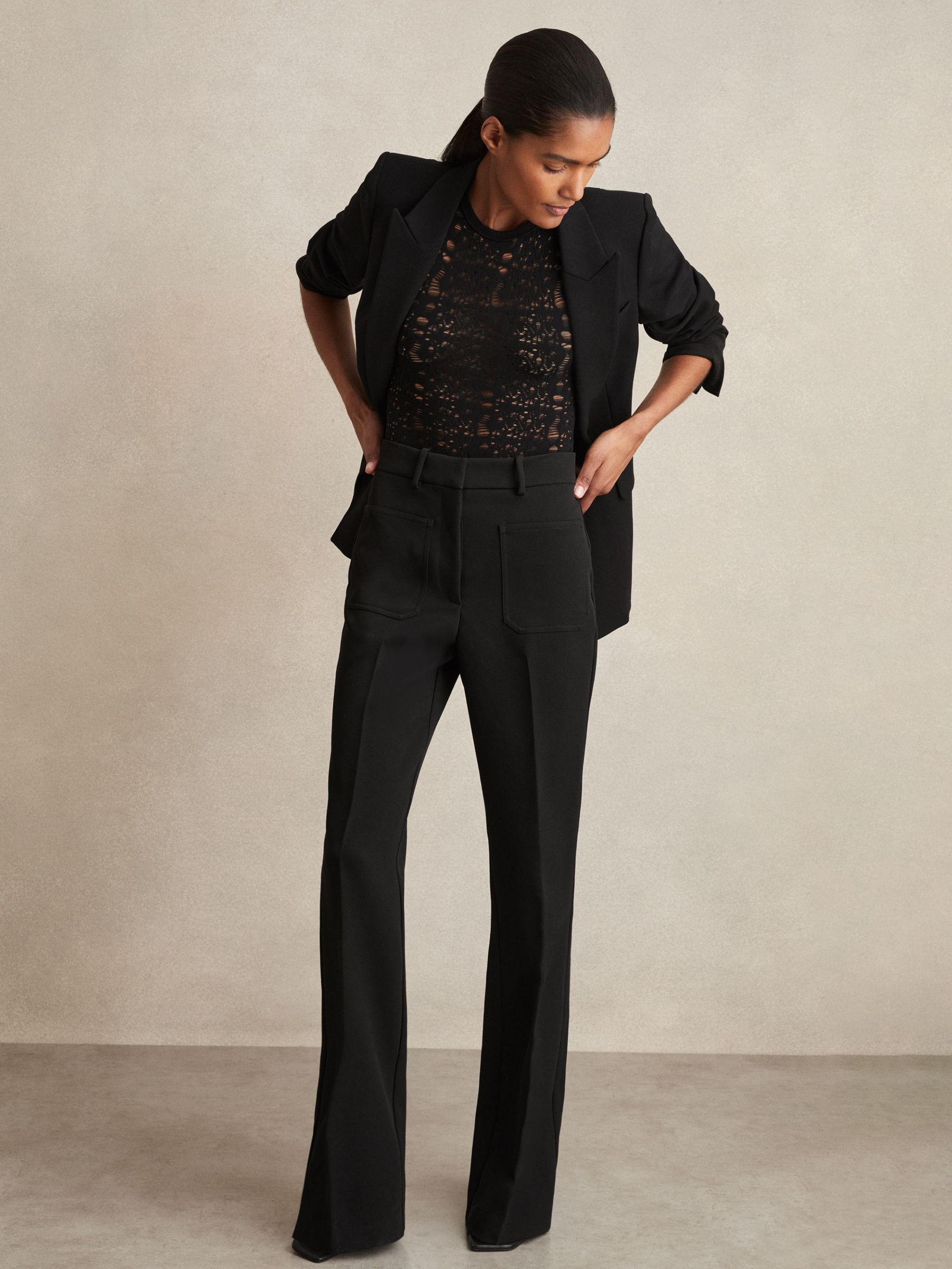 Petite Twill High Rise Flared Trousers in Black (AD9462) | US$245
