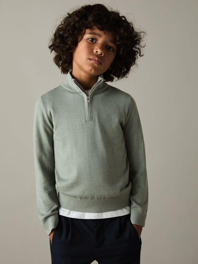 Pullover aus Merinowolle mit Trichterkragen und halbem Reißverschluss in Kräutergrün, 3–9 J. (AJ9003) | 50 €