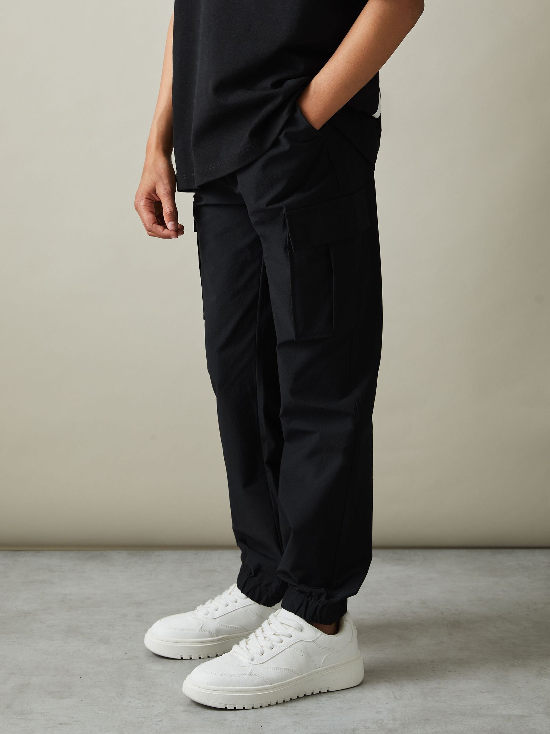 Technical Drawstring Trousers in Black (AL5280) | US$60