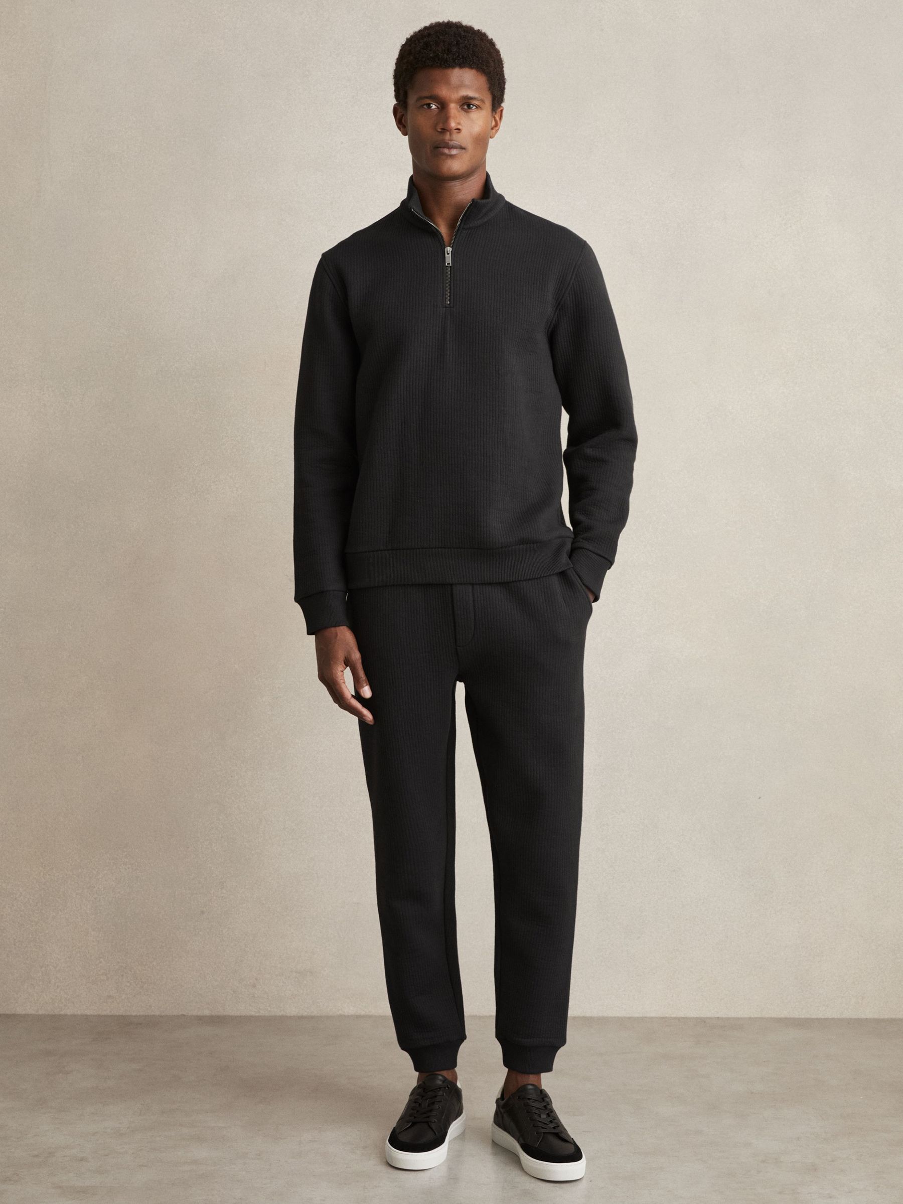 Cotton-Blend Ribbed Drawstring Joggers in Washed Black (AM5317) | US$78