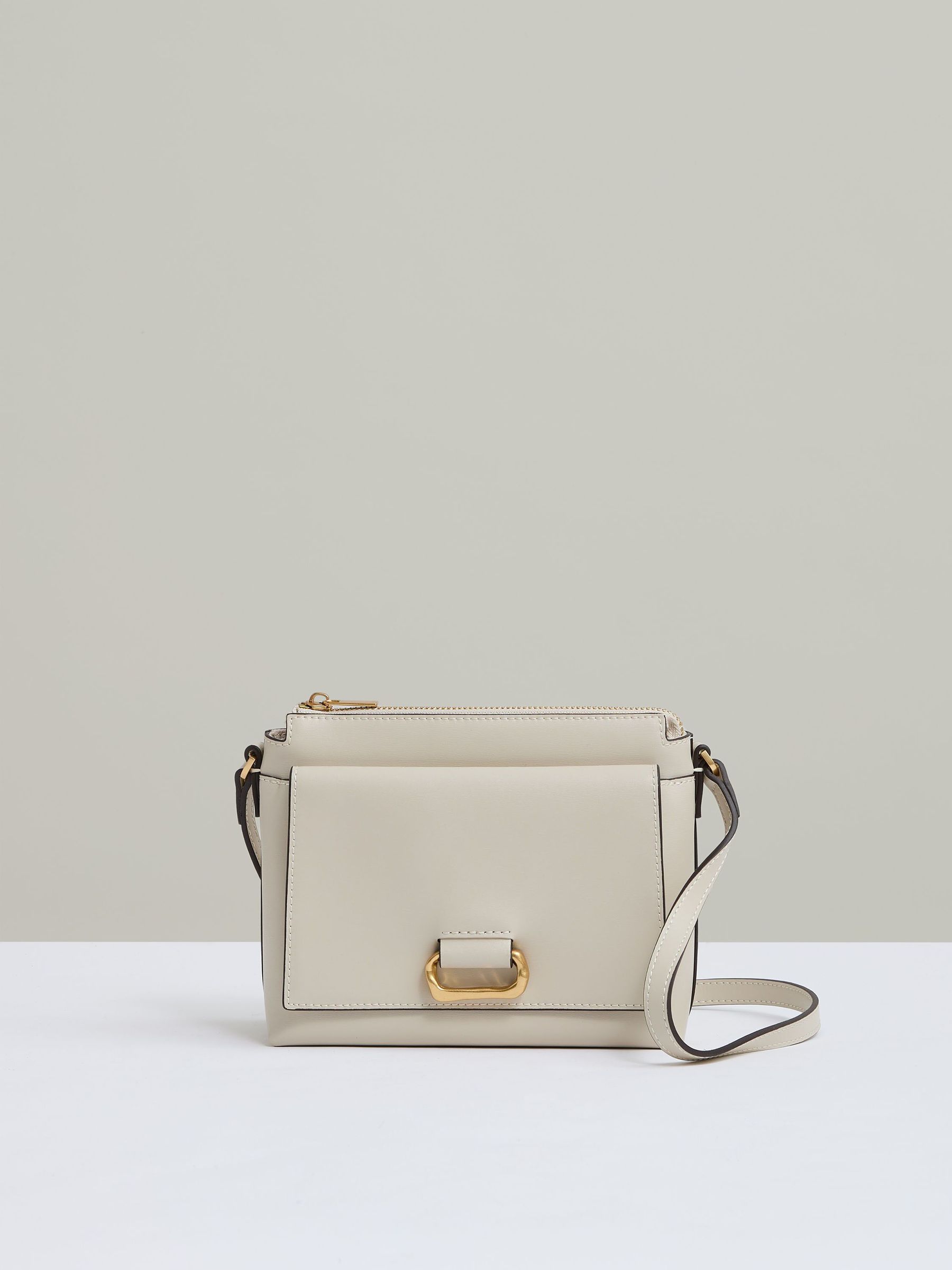 Leather Sculpted-Hardware Cross-Body Bag in Off White (AN3280) | US$240