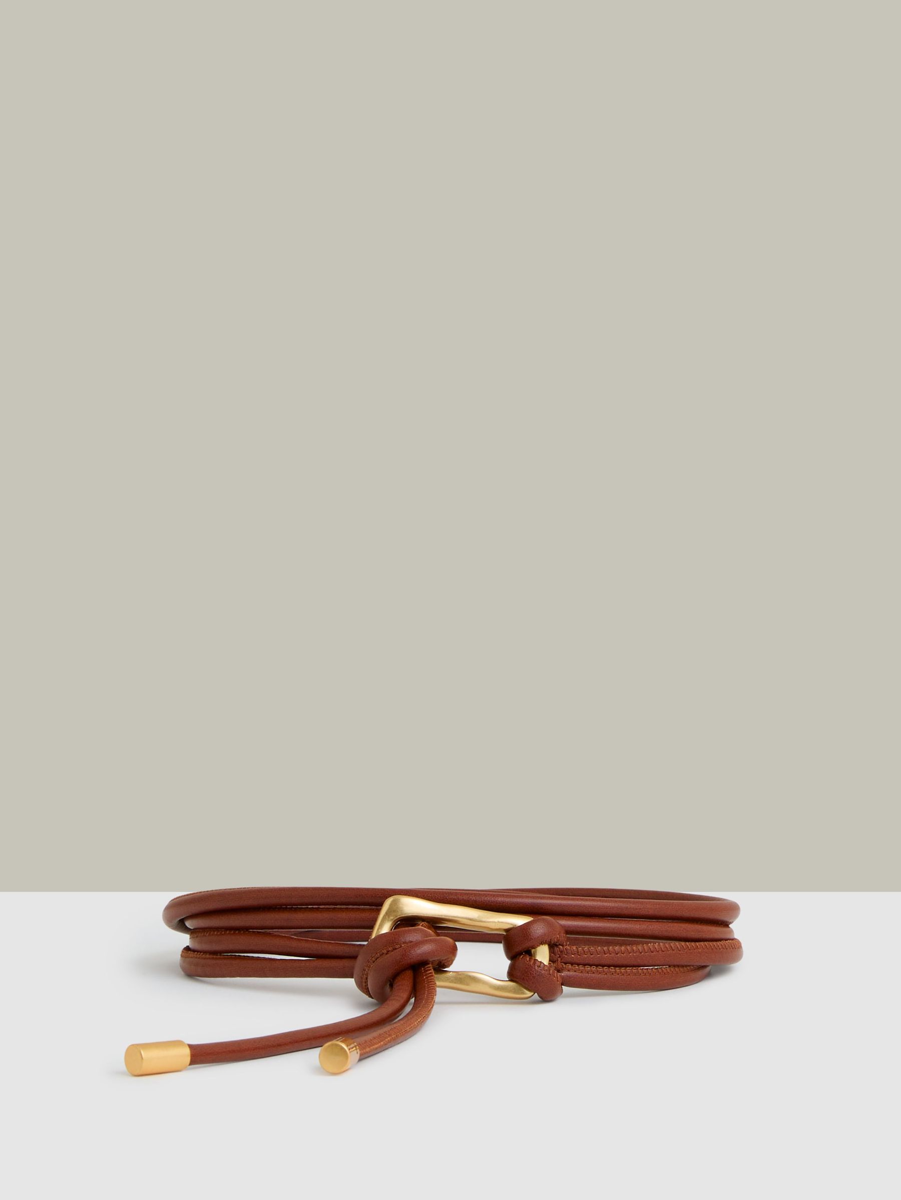 Sculpted Buckle Tubular Tie Belt in Tan (AR6542) | US$95