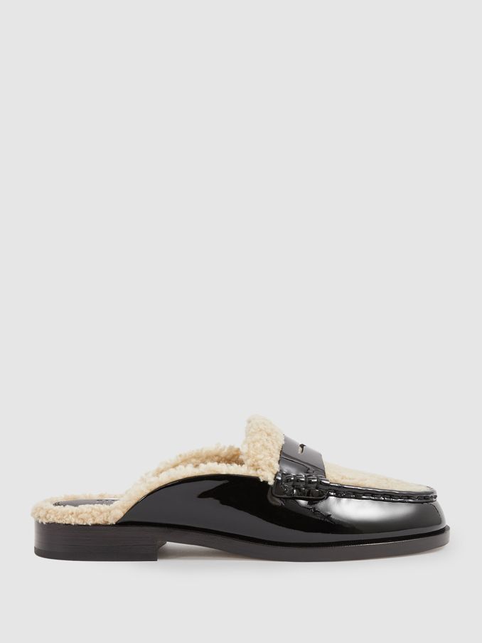 Paige Leather And Shearling Loafer Mules in Black (AT5457) | €420