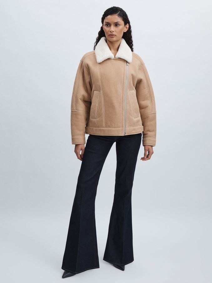 Paige Angled-Waist Flared Jeans in Kira Blue (AU1744) | CHF 202