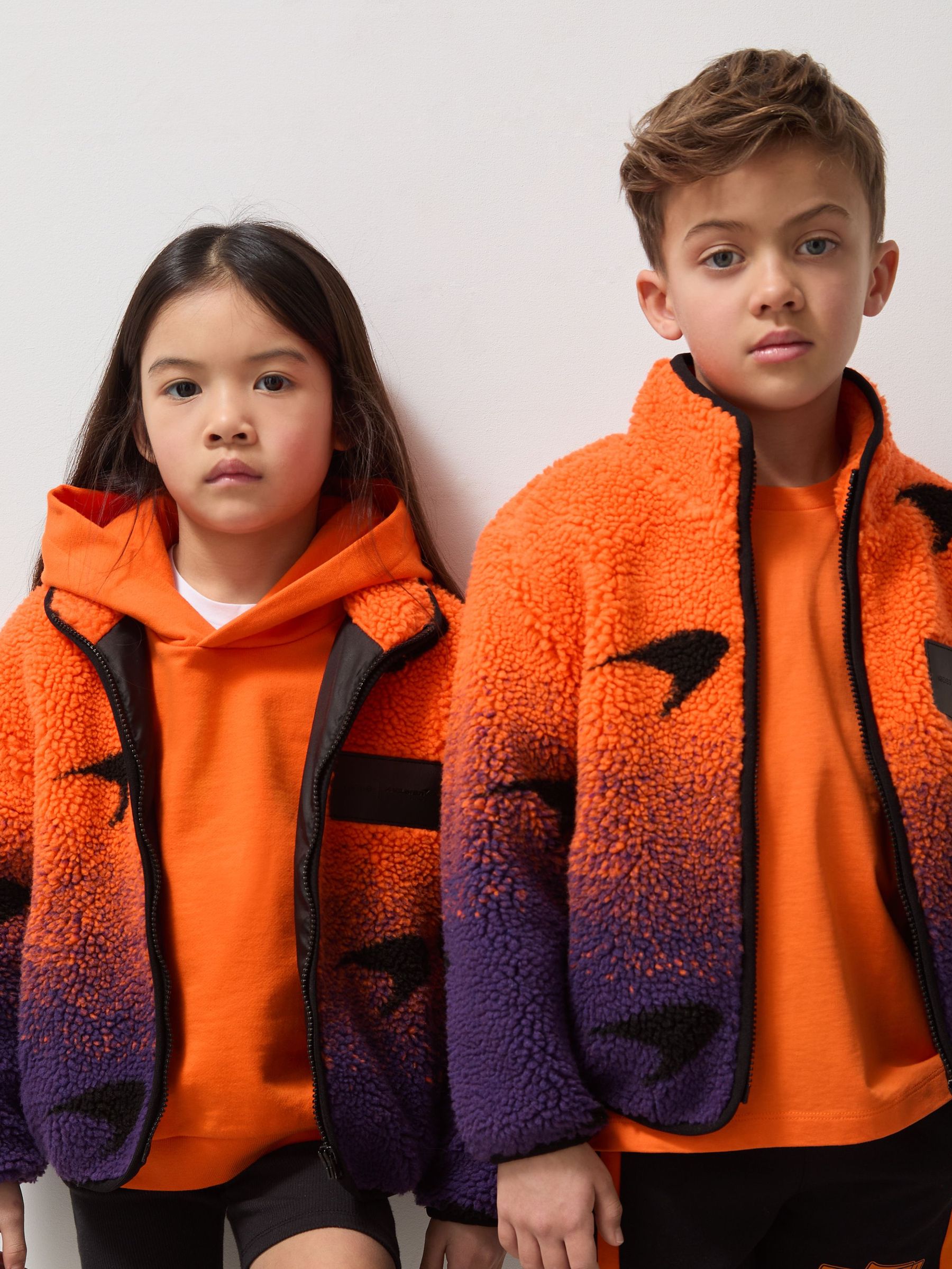 3-9 yrs Unisex Fit McLaren F1 Team Ombré Fleece Jacket in Papaya Orange/Purple (AW3956) | €95