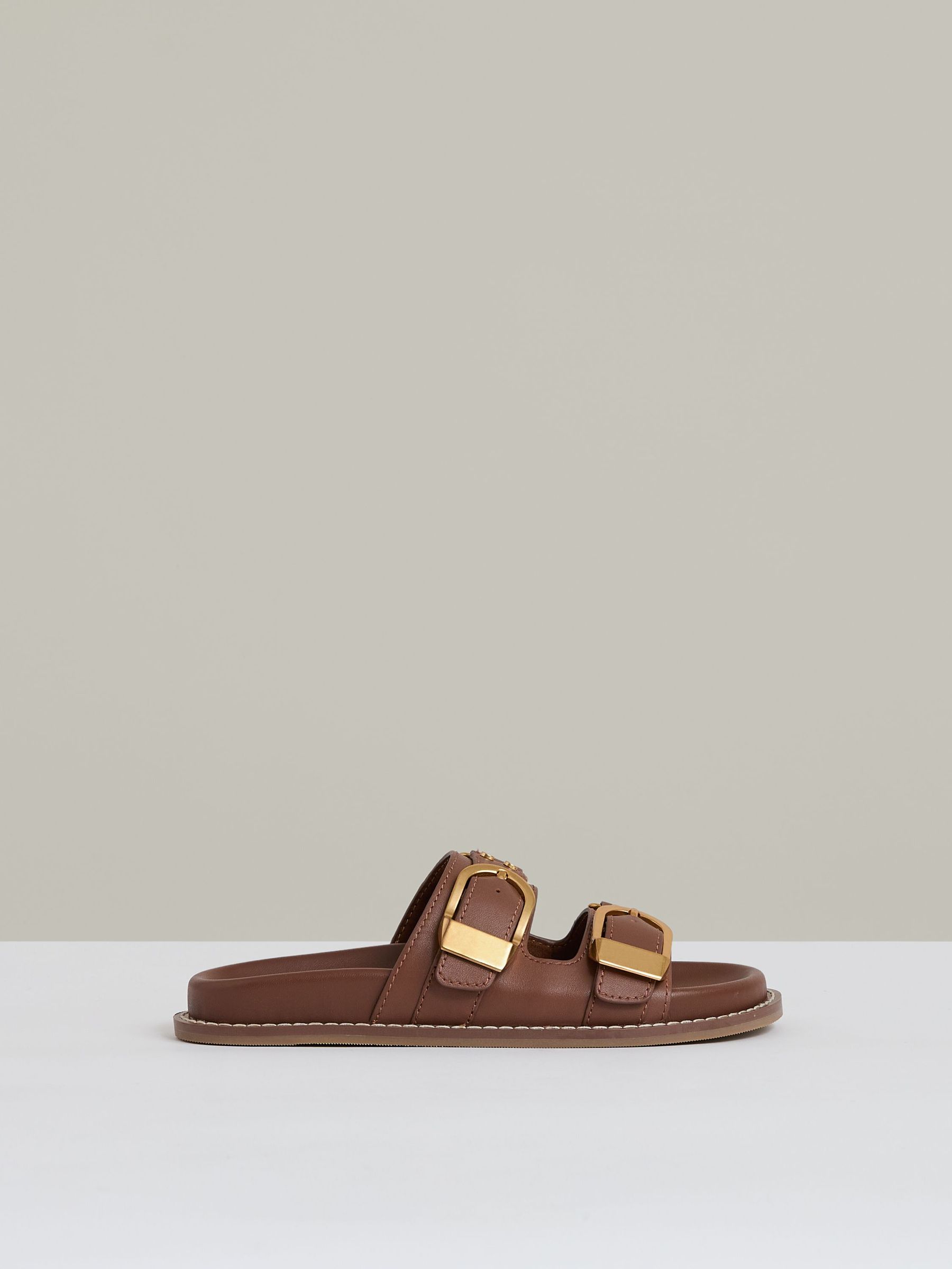 Leather Buckled Slip-On Sandals in Tan (AY4965) | US$285