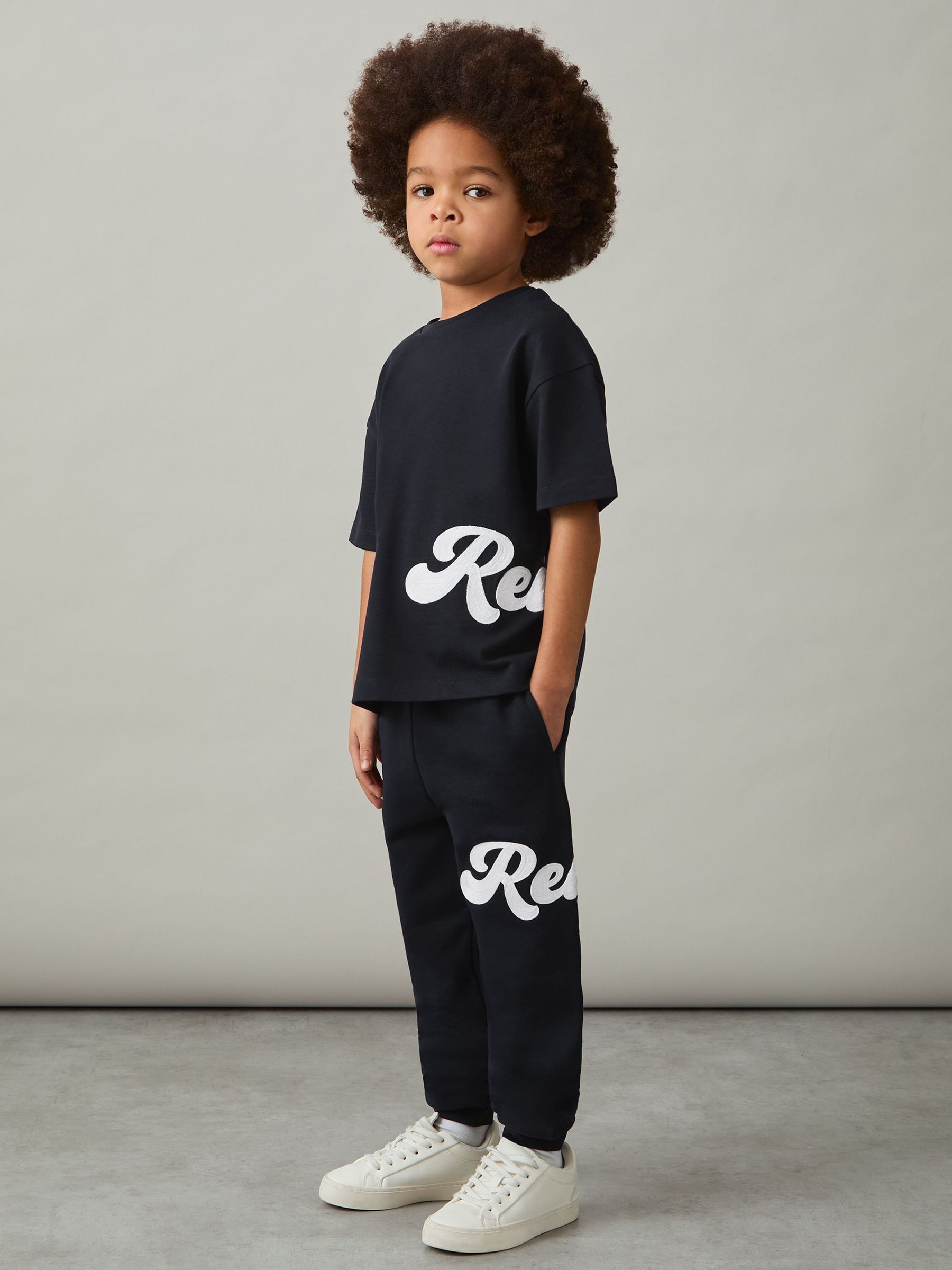 T-shirt oversize en coton avec logo script 3-9 ans, bleu marine (AY7484) | 25 €