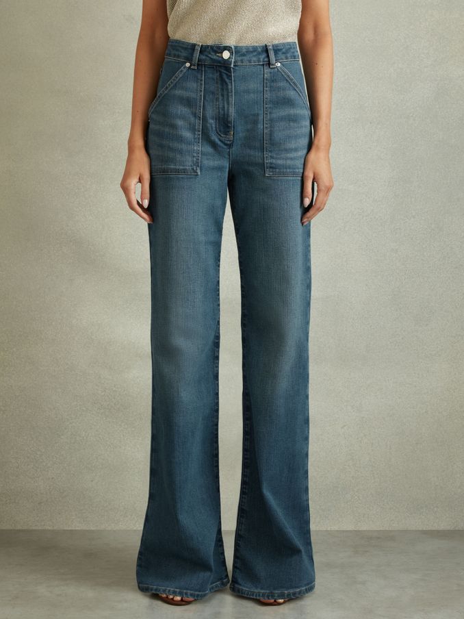 Petite Mid Rise Flared Utility Jeans in Mid Blue (B41134) | US$94