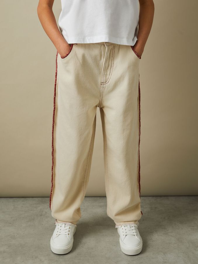 Jean à ourlet effiloché avec surpiqûres contrastées 9-13 ans, écru (B82519) | 35 €
