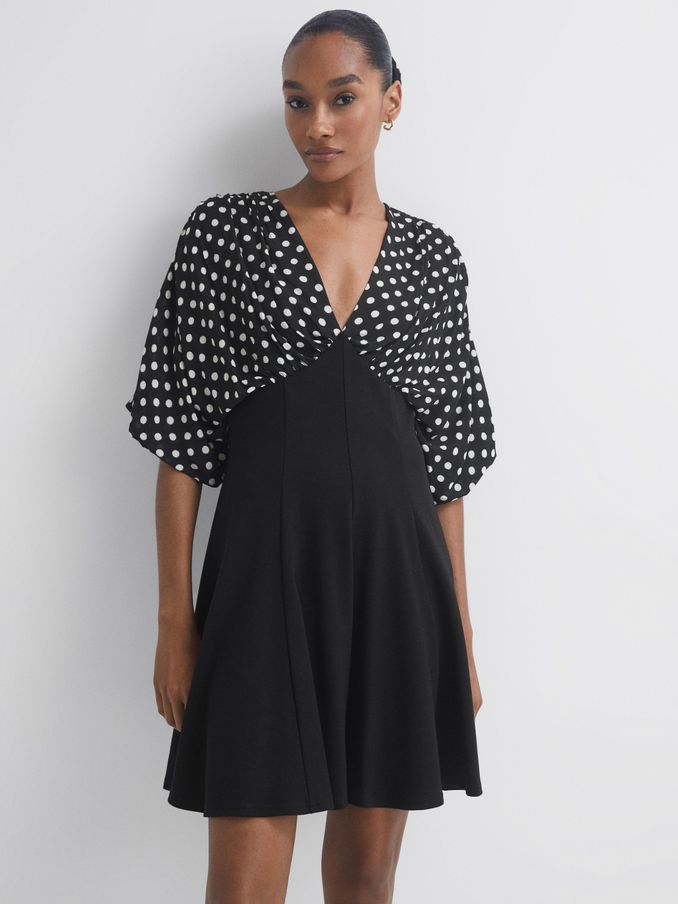 Florere Polka Dot Mini Skater Dress in Black (C35947) | €84
