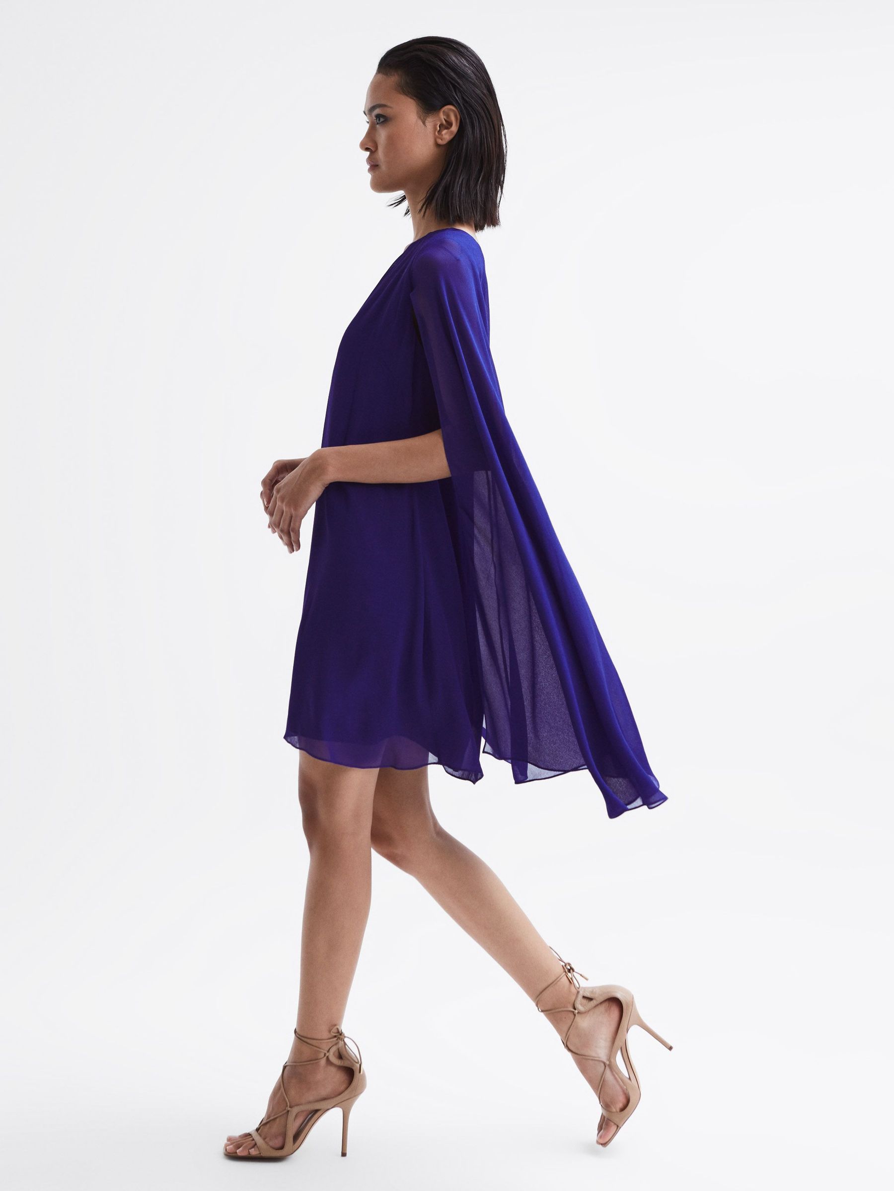 Sheer Cape Sleeve Mini Dress in Purple (D28631) | US$99