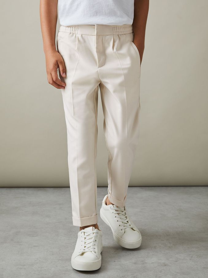9-14 yrs Relaxed Elasticated Trousers with Turn-Ups in Ecru (D85486) | US$24