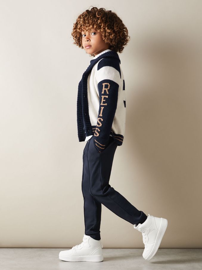 3-9 yrs Knitted Varsity Cardigan in Off White/Navy (E27144) | €43