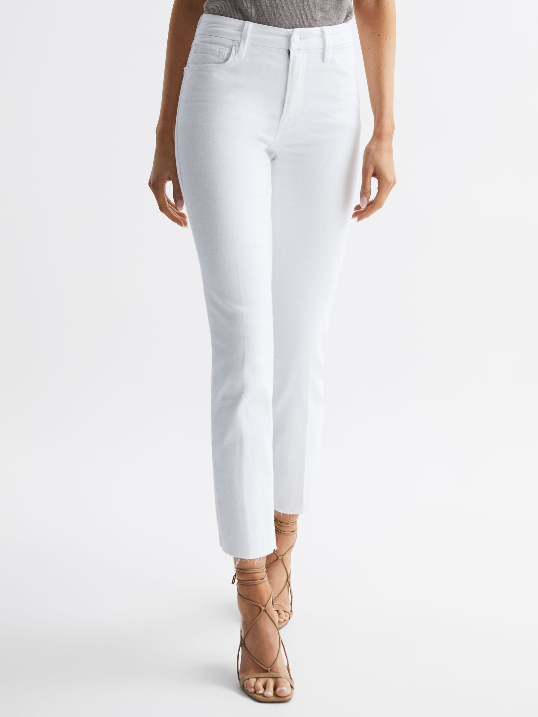 Good American Straight Leg Skinny Jeans in White (E47275) | €130