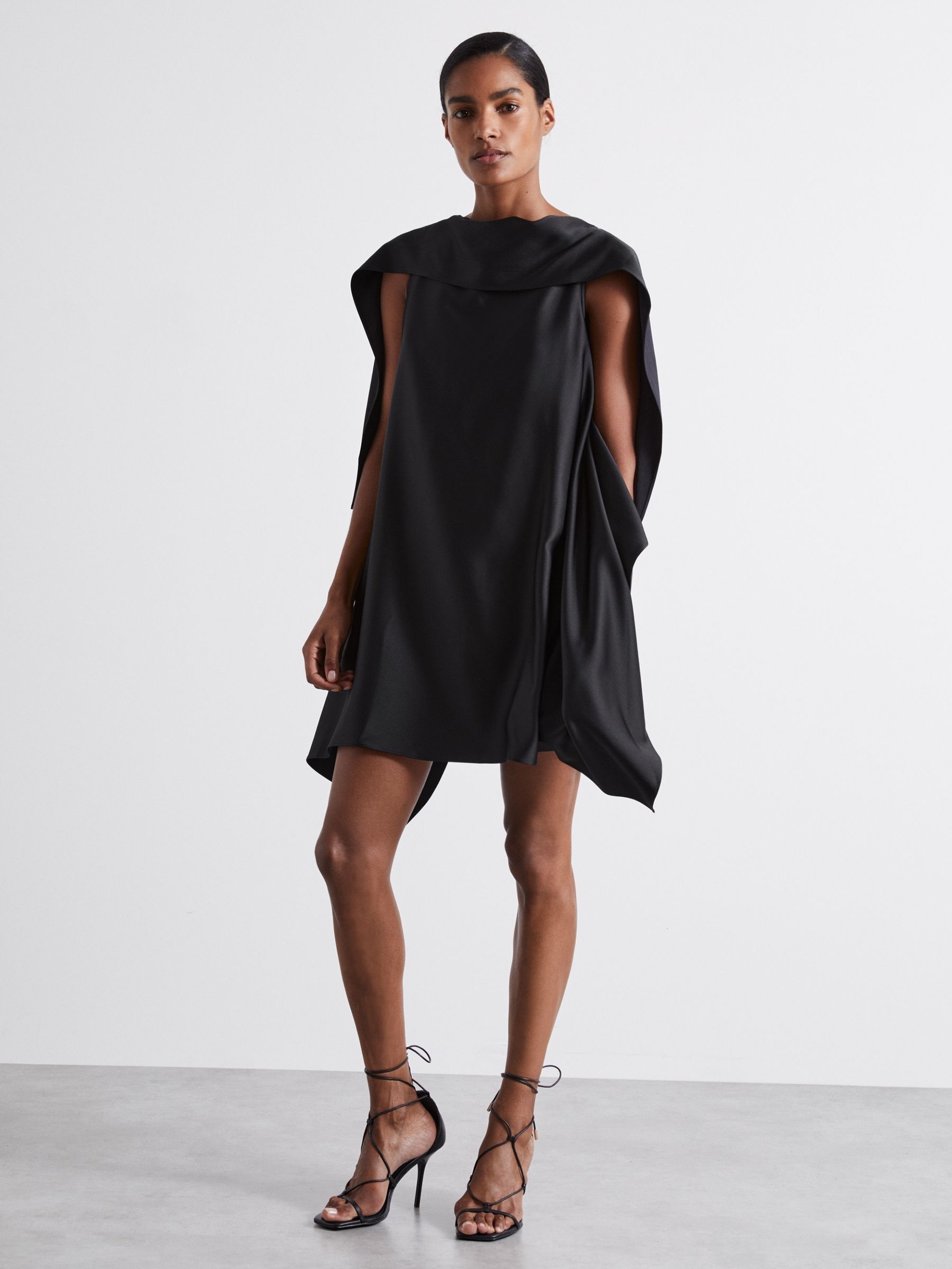 Atelier Asymmetric Satin Cape-Sleeve Mini Dress in Black (E52869) | US$342
