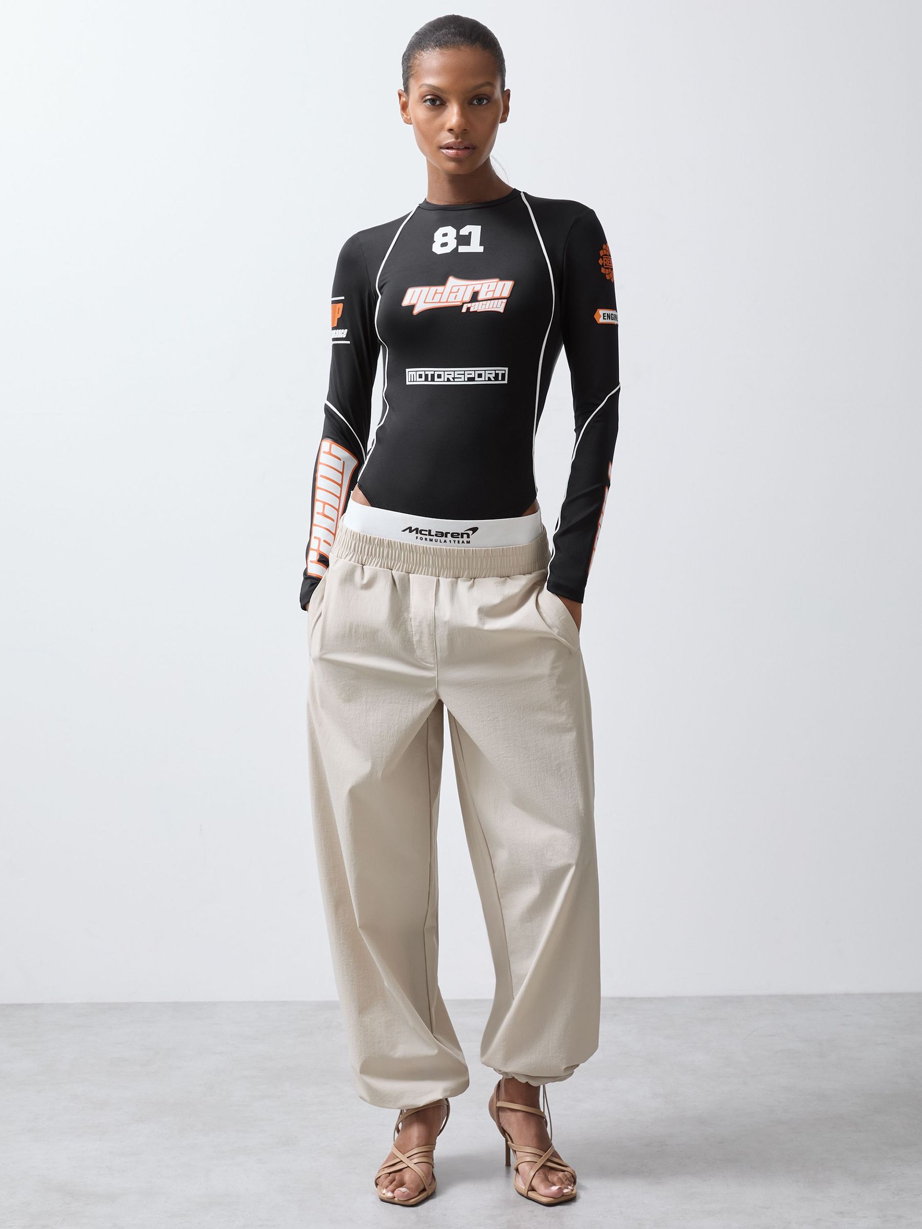 McLaren F1 Team Printed Race Bodysuit in Black (F06888) | €145