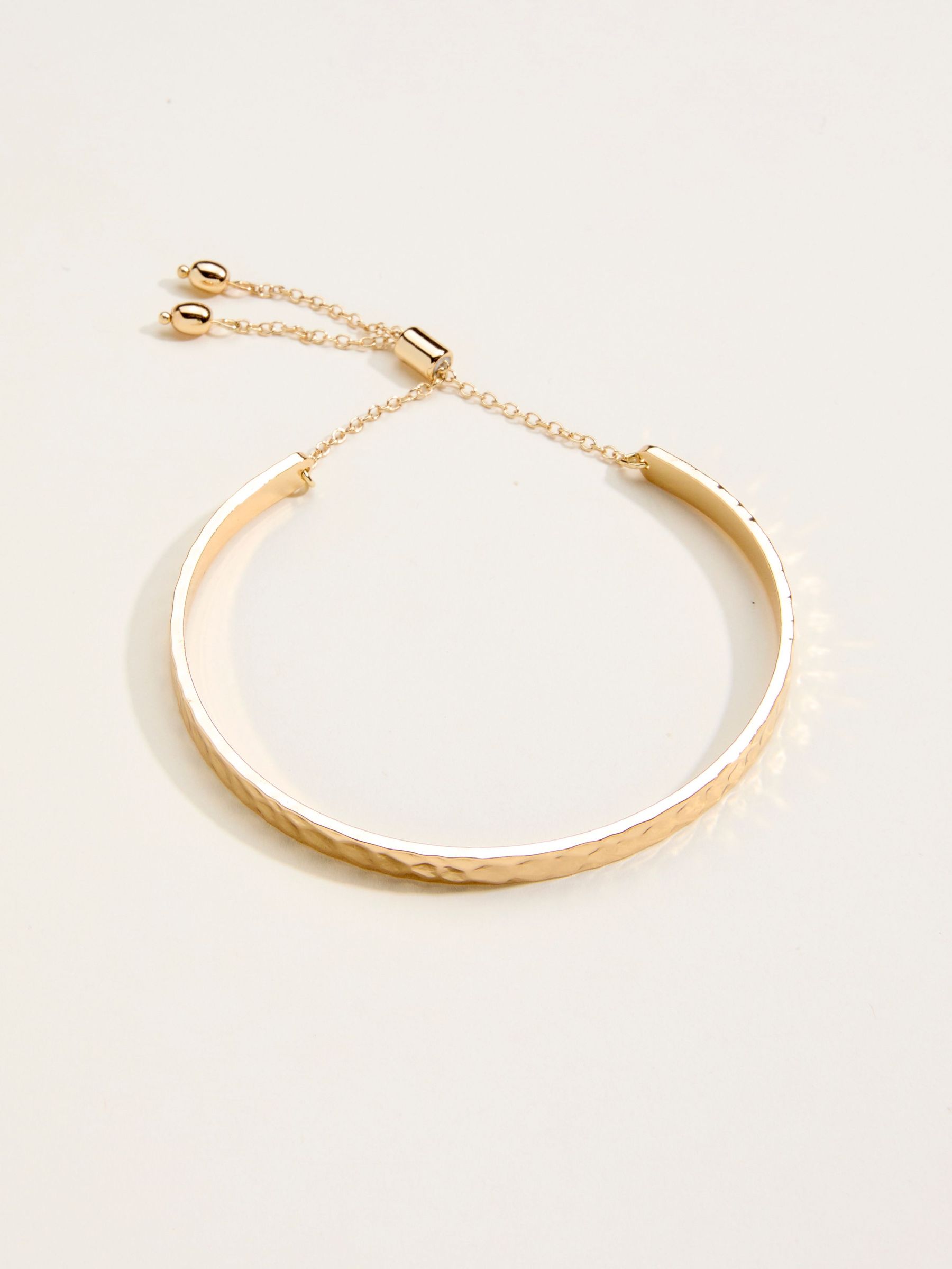 Gold Tone Hammered Bangle (F21620) | $25