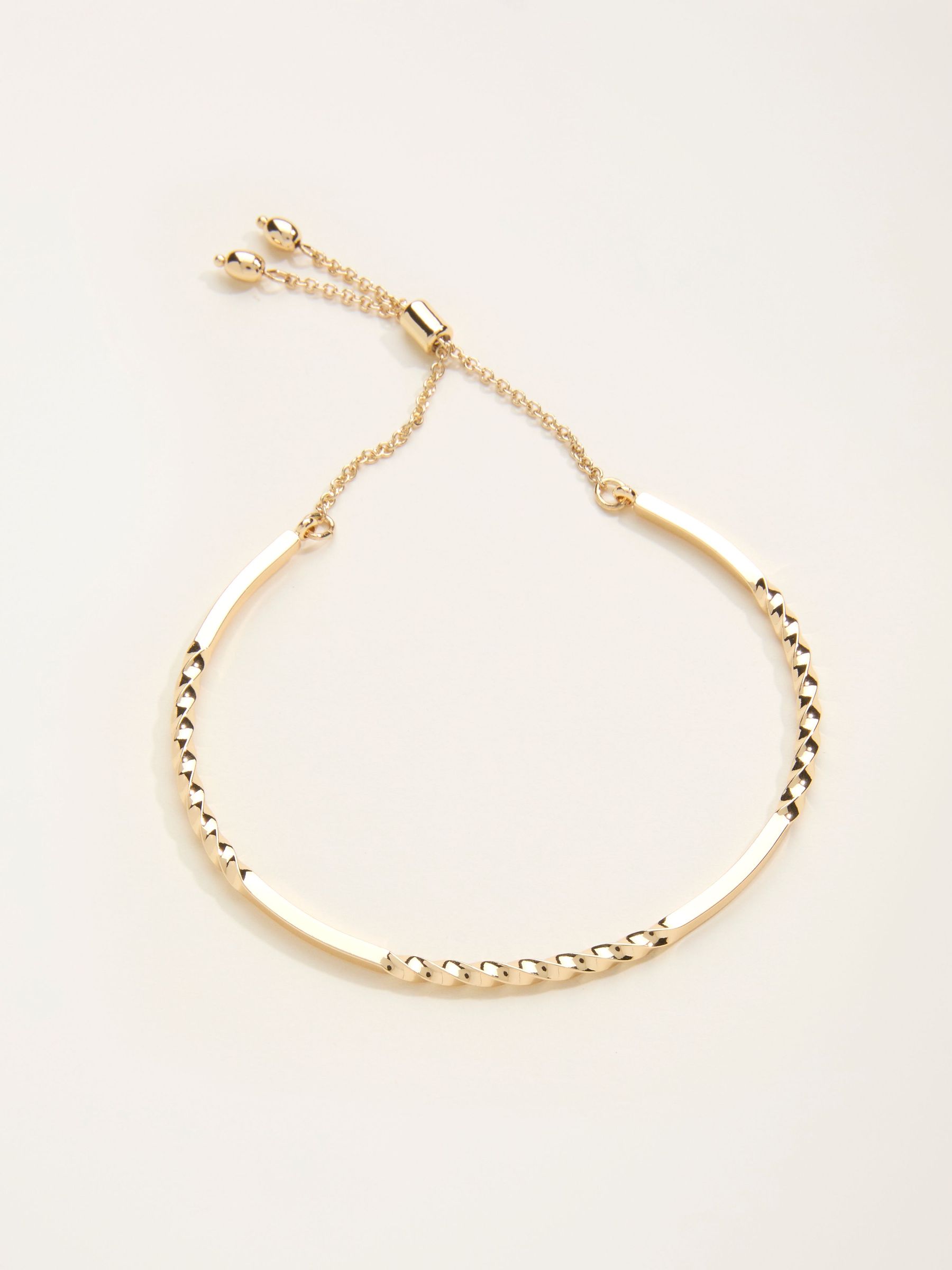 Gold Tone Twist Adjustable Bracelet (F21660) | €19