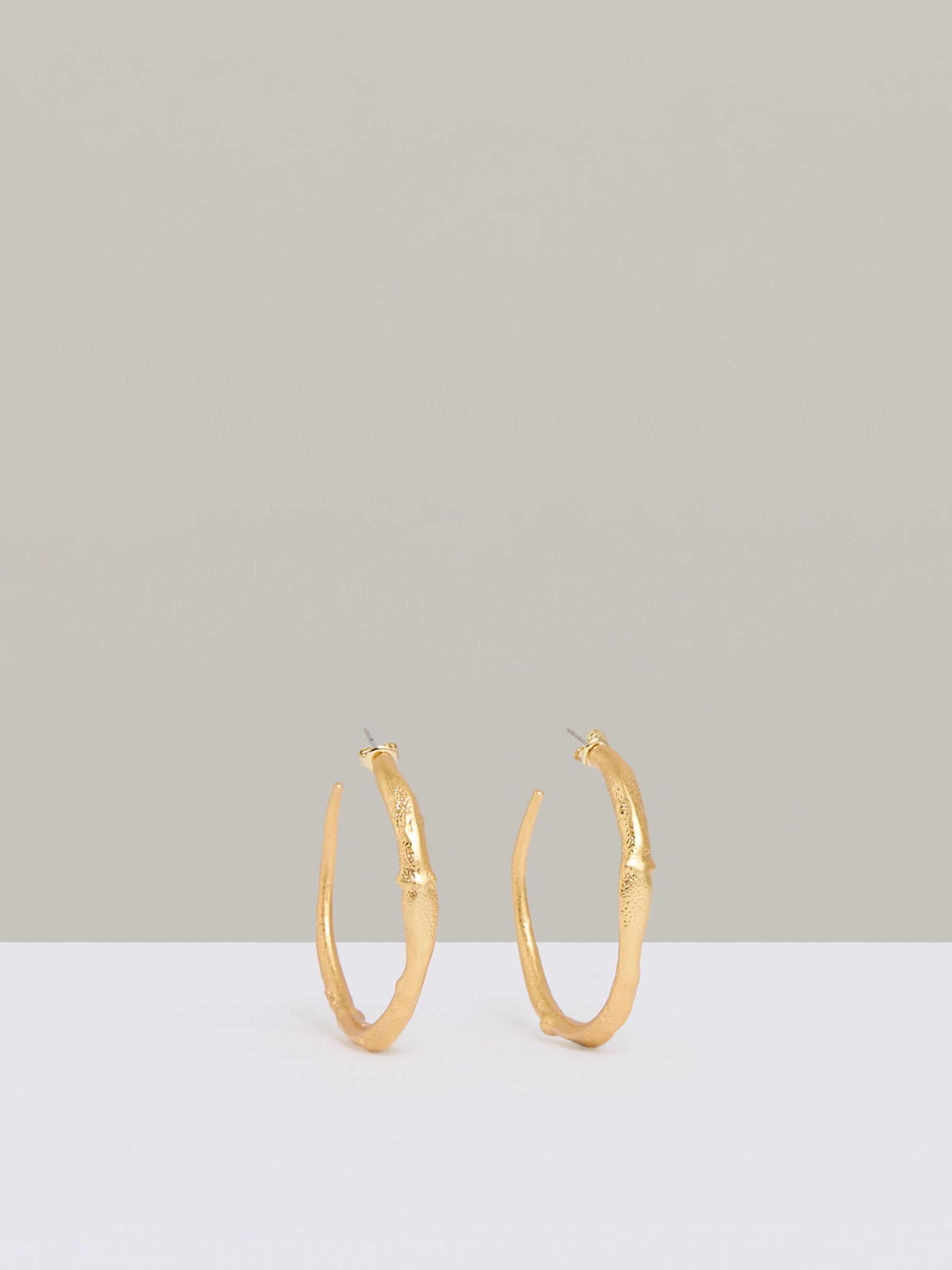 Molten Hoop Earrings in Gold Tone (F27991) | €70
