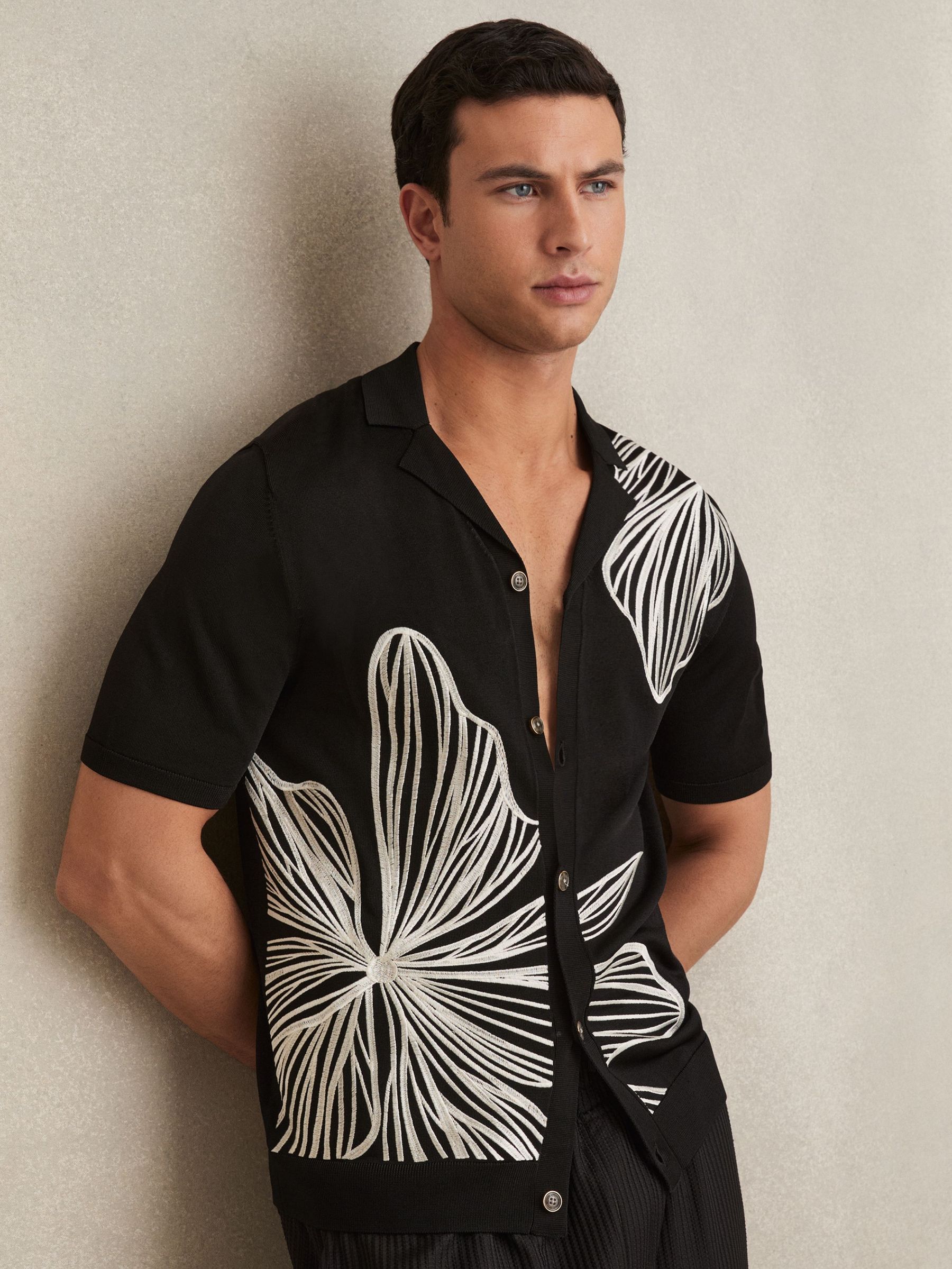 Flower Embroidered Knit Shirt in Black (F32813) | US$225