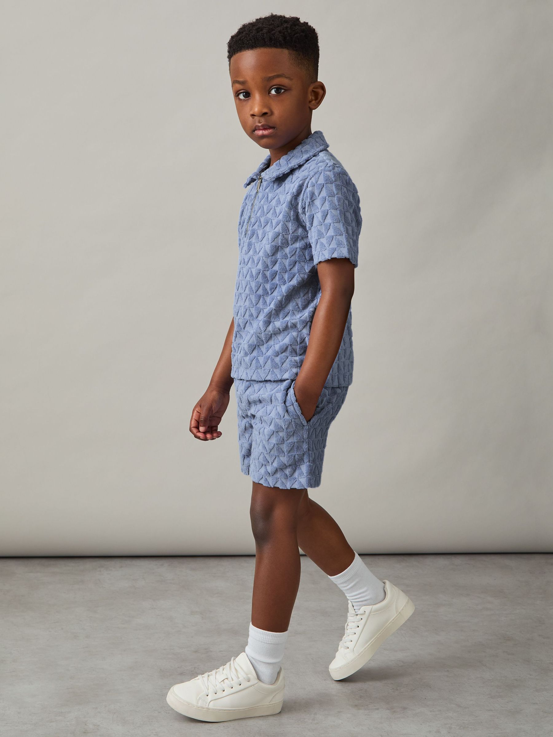 Polo texturé en tissu éponge 3-9 ans, bleu Airforce (F45232) | 35 €