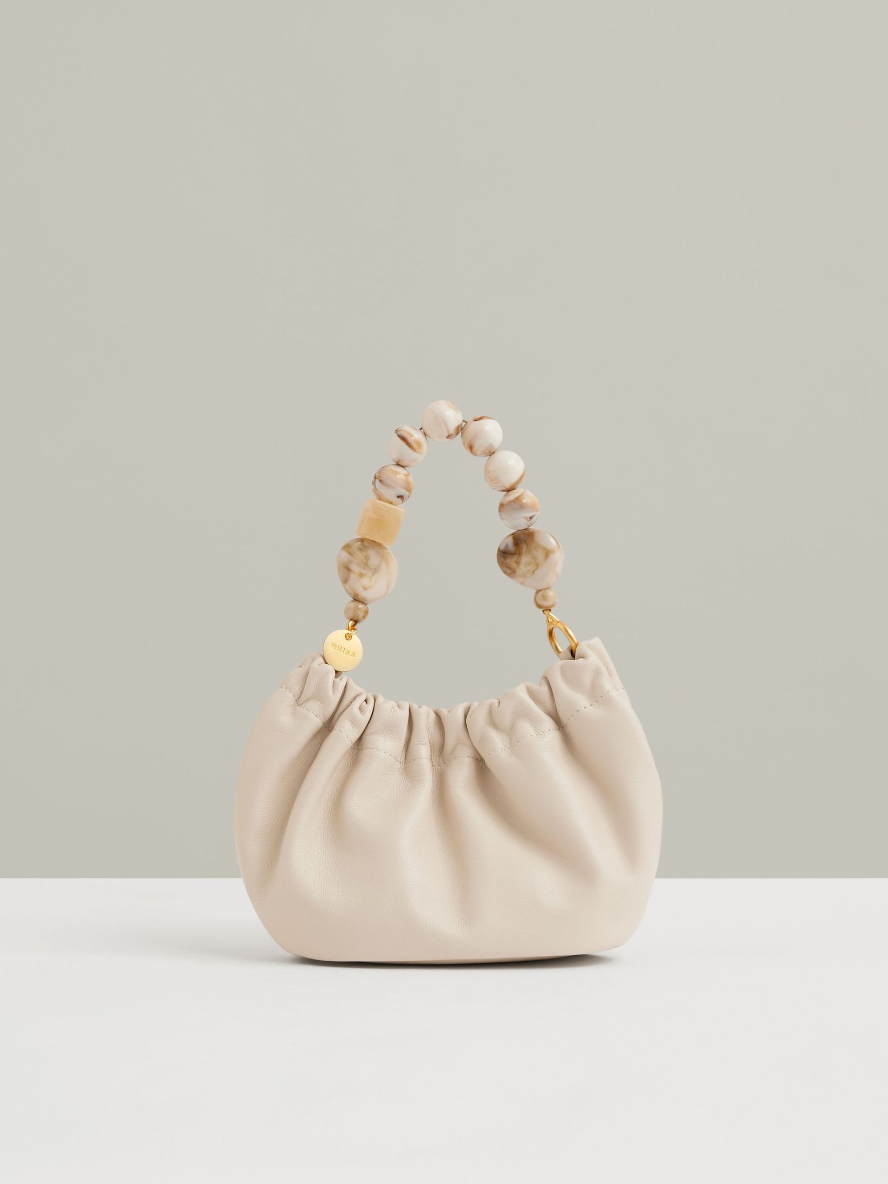 Leather Bead-Handle Pouch Bag in Off White (F53744) | US$240