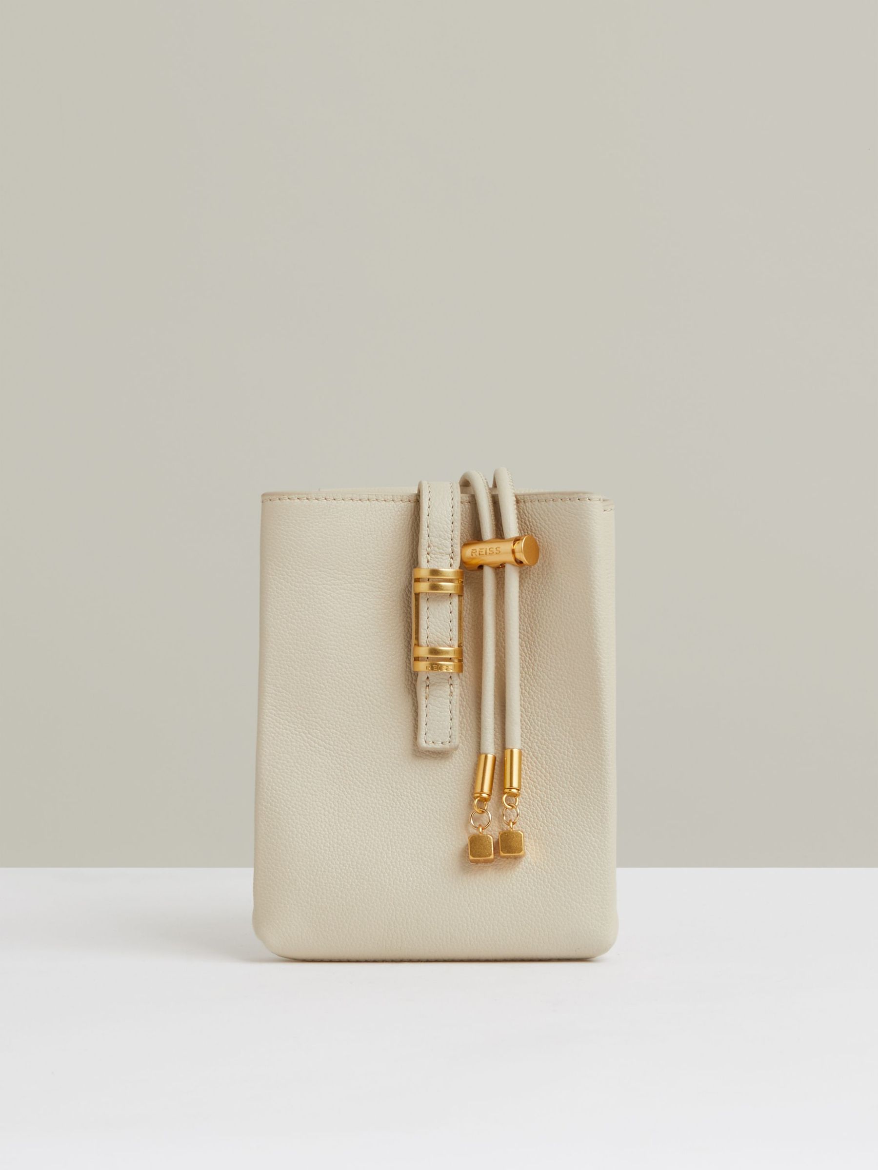Leather Phone Holder in Off White (F85189) | US$160