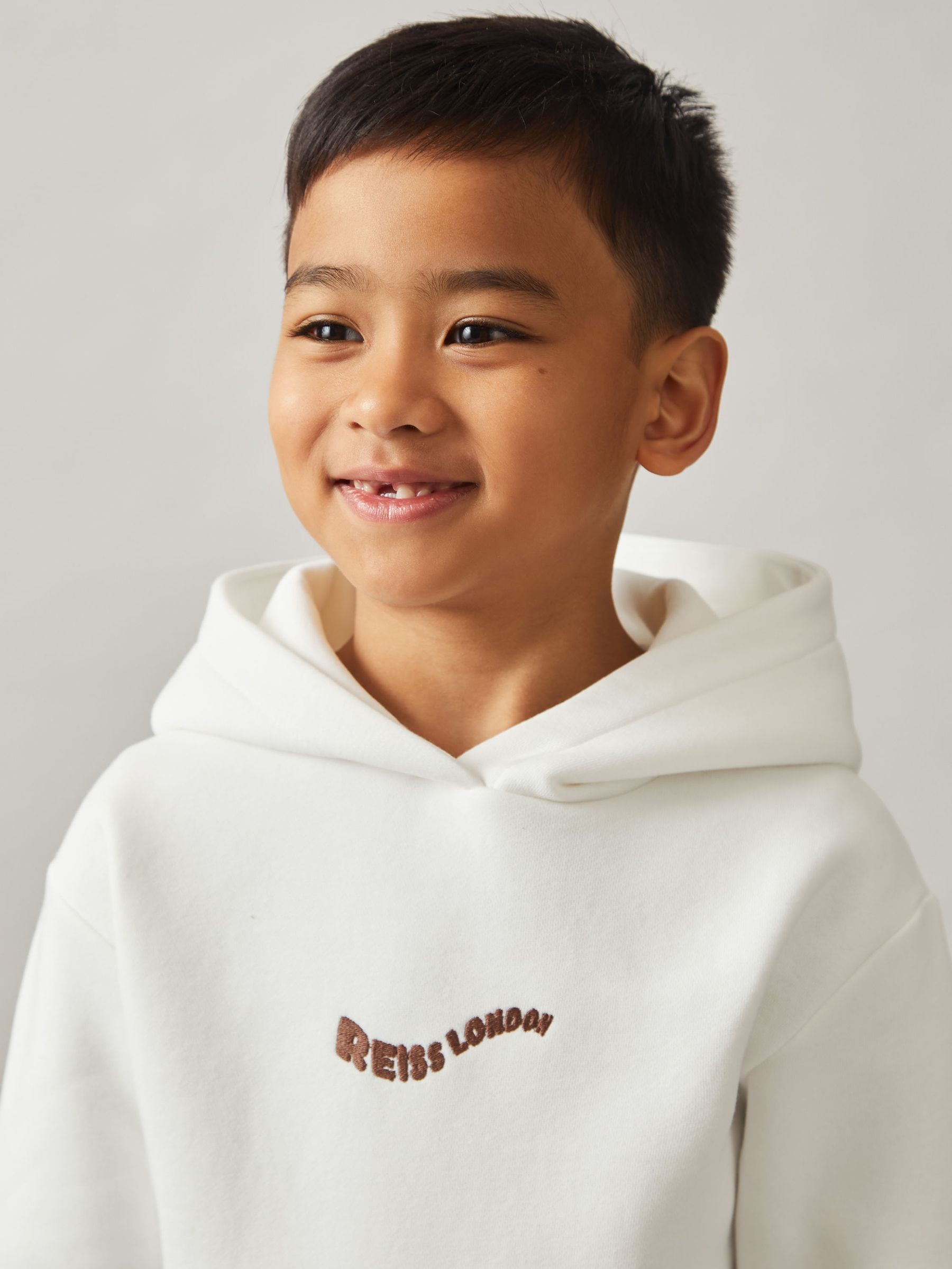 Cotton-Blend Palm-Embroidered Hoodie in Off White (F93833) | US$60