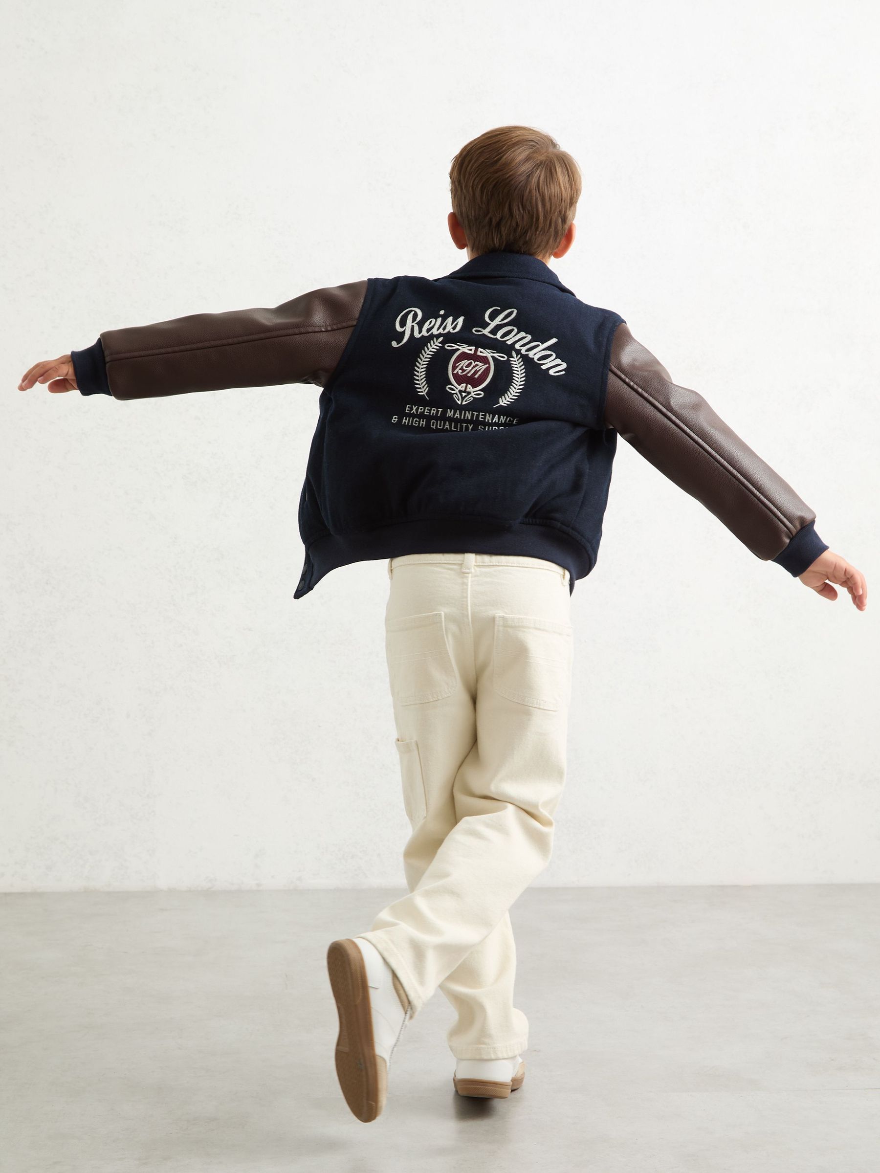 9-13 yrs Motor Cars Press-Stud Bomber Jacket in Navy/Brown (F97788) | 450 QAR