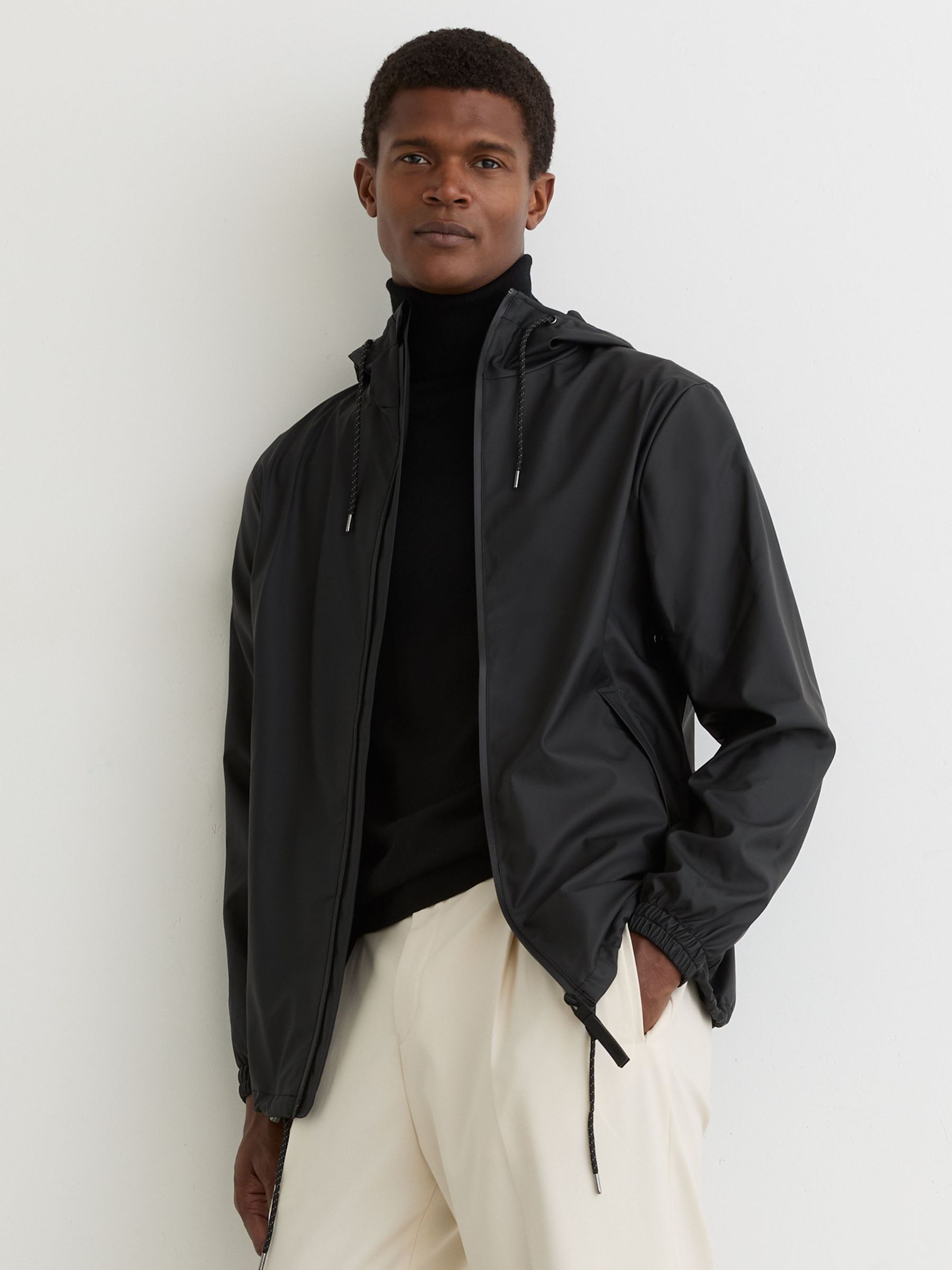 Rains Waterproof Hooded Raincoat in Black (G19800) | $175