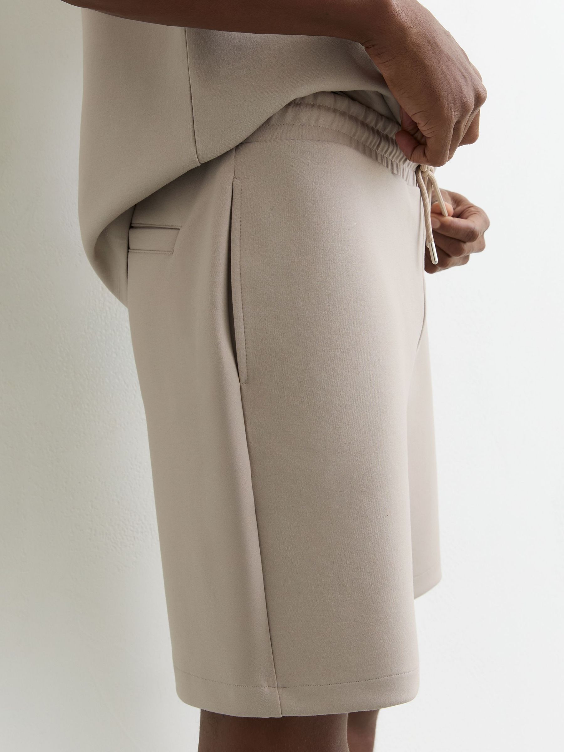 Premium Interlock Drawstring Shorts in Stone (G49910) | €95