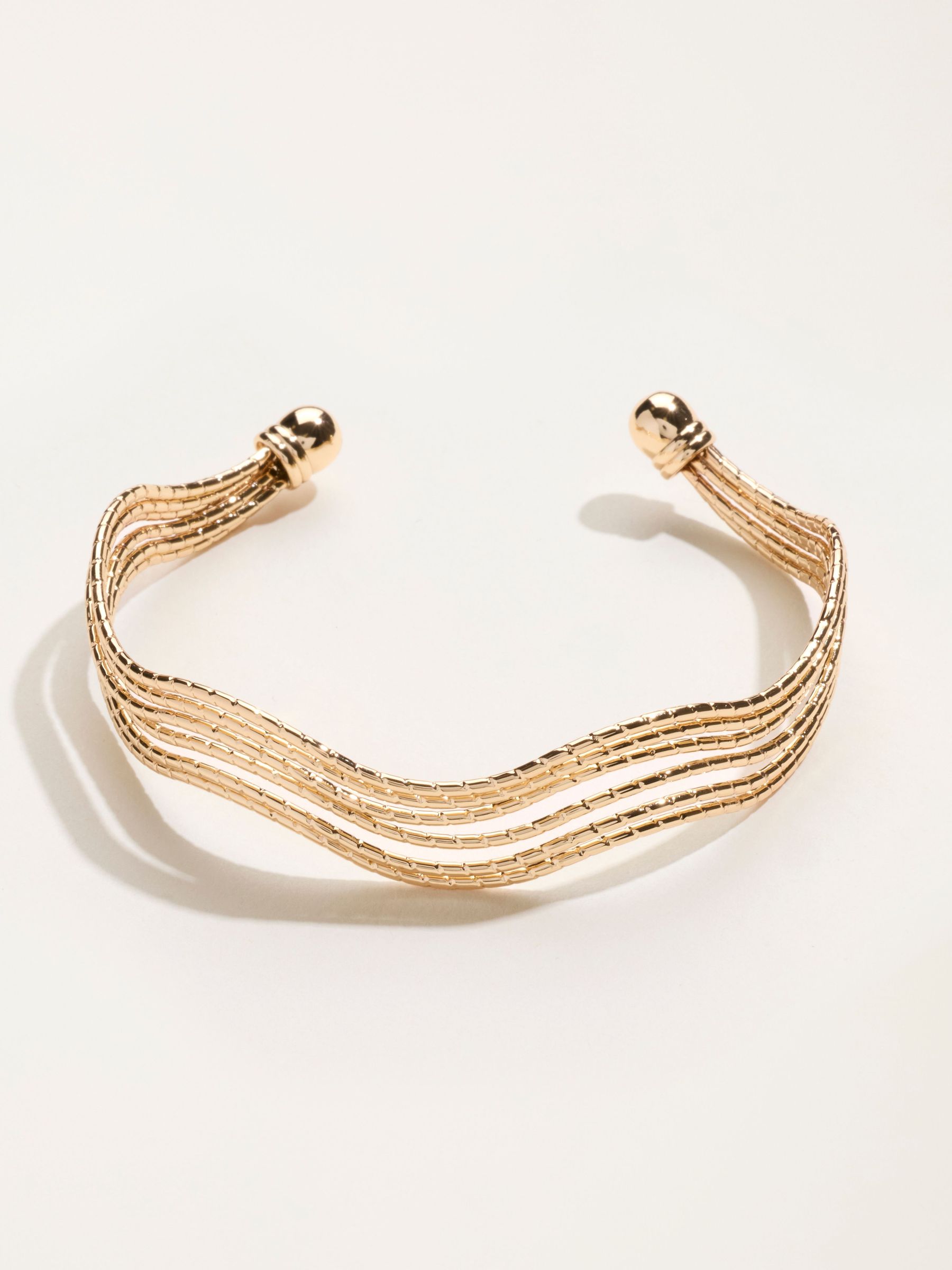 Gold Tone - Wavy Bangle