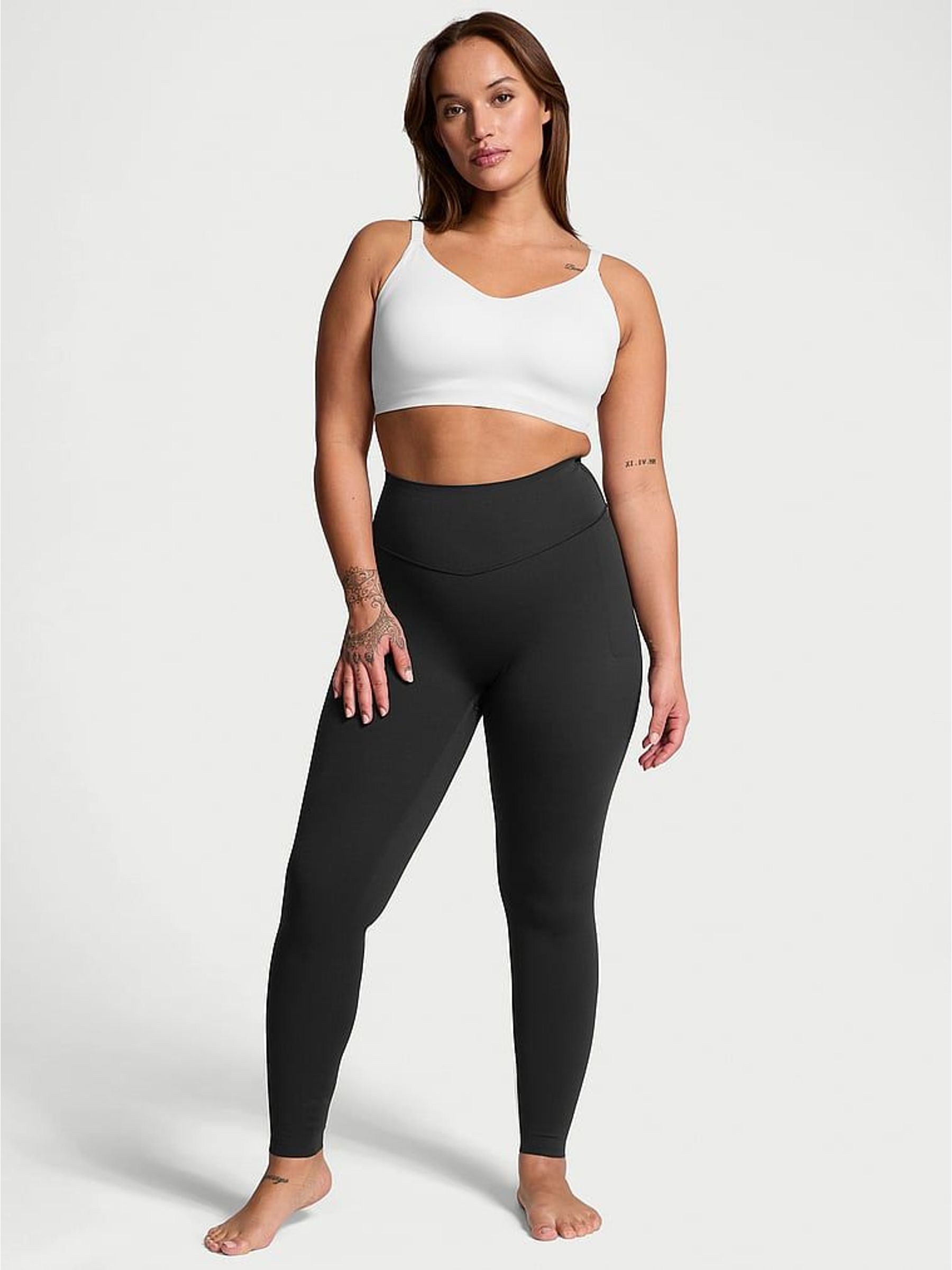 Black Elevate™ Low Support Leggings with Pockets (H27922) | €87