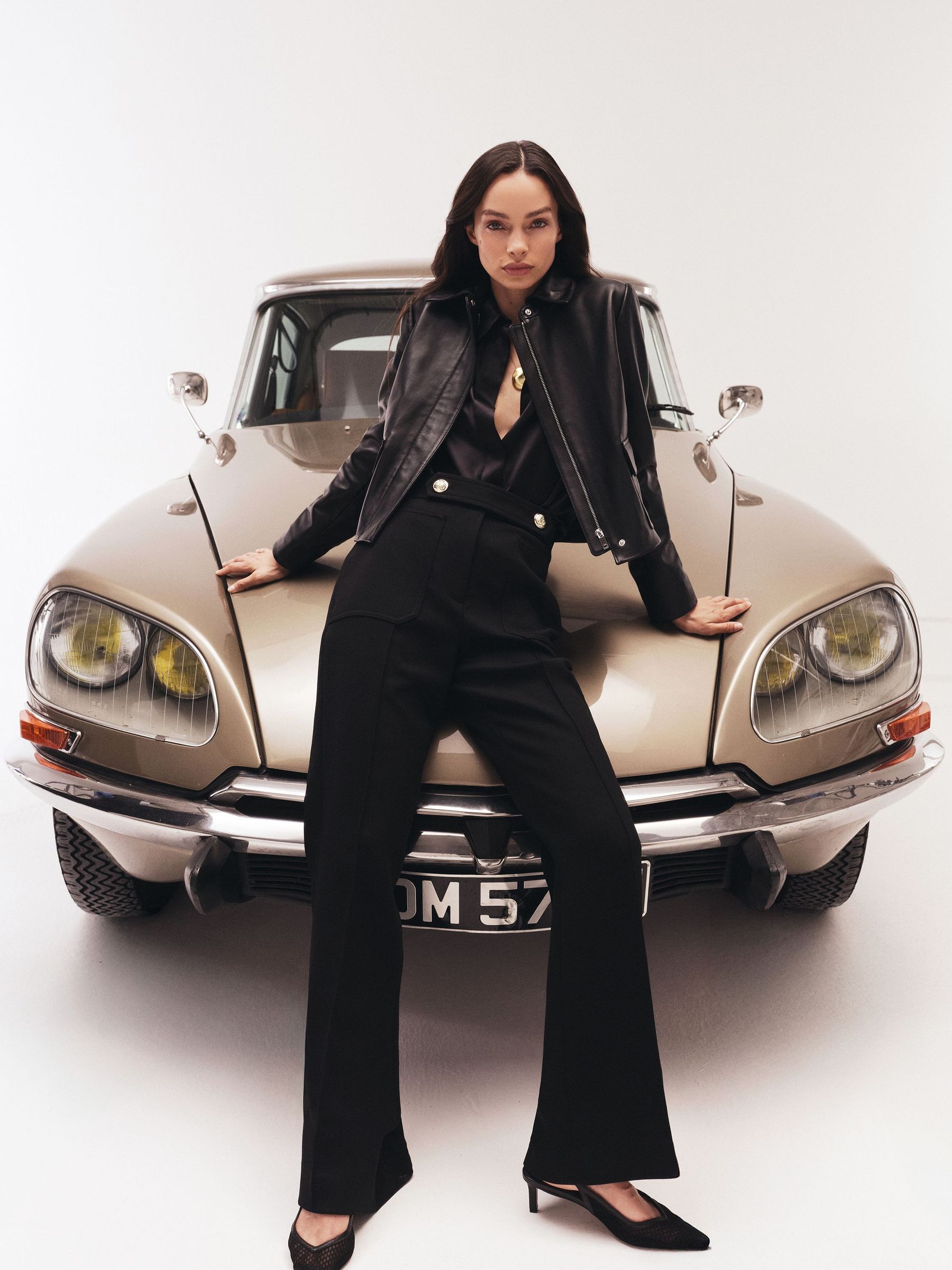 Twill Button-Tab Flared Trousers With Wool in Black (H44715) | 1,035 QAR