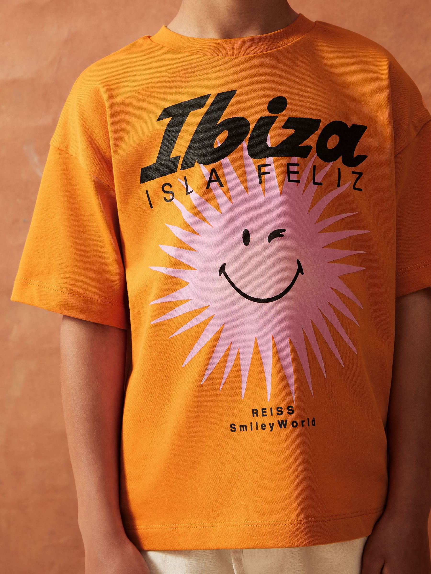 9-13 yrs SmileyWorld | Reiss Sun Motif T-Shirt in Orange (H51591) | €20