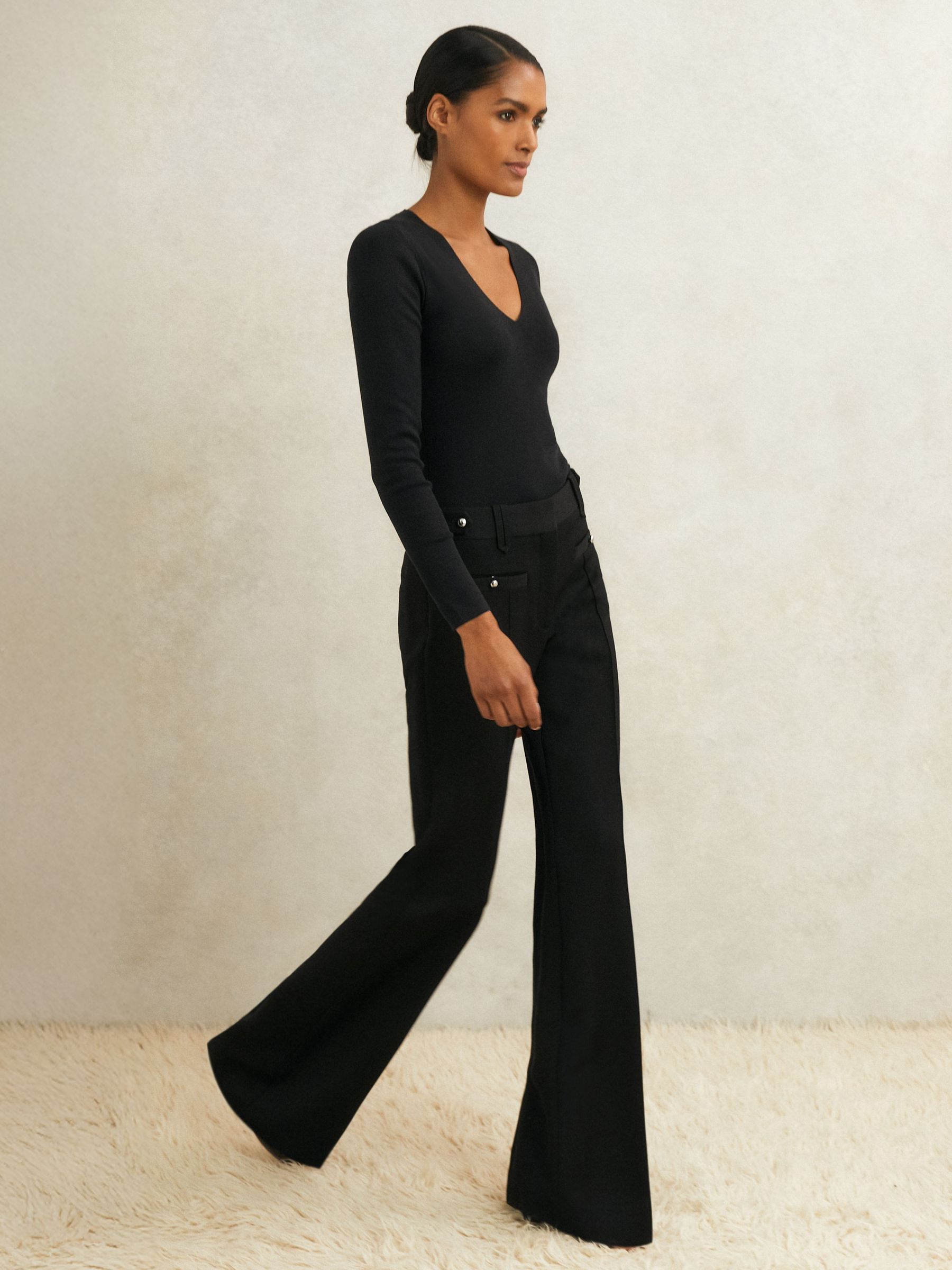 Atelier Wool Stud Flared Trousers in Black (H59745) | 1,280 QAR