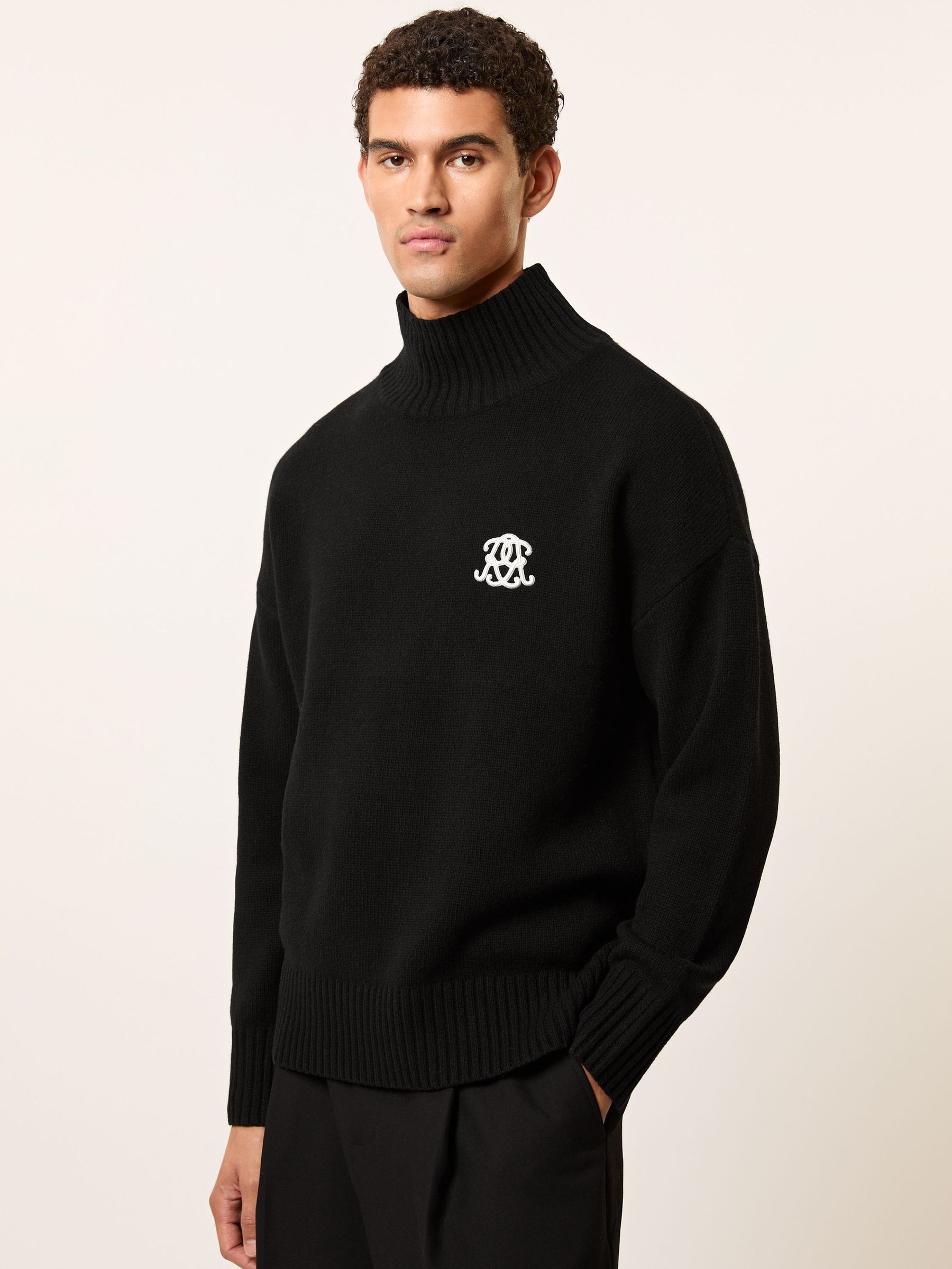 Monogram Wool Funnel-Neck Jumper in Black (H62793) | €195