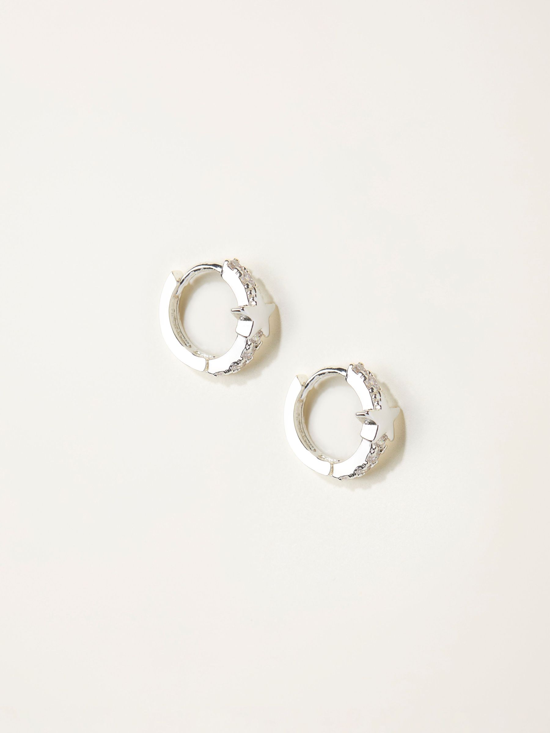 Silver Tone Star Huggie Earrings (H68339) | €13.50
