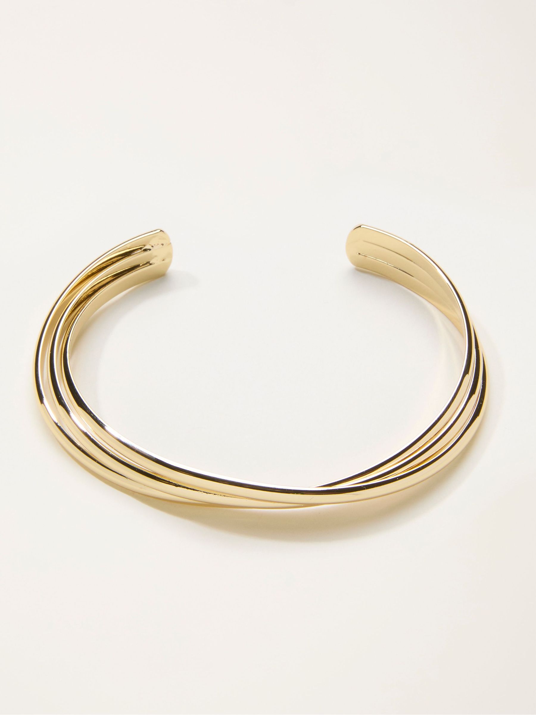 Gold Tone Twist Bangle (H68388) | €19