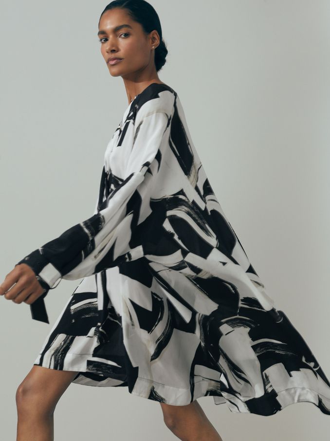 Atelier Italian Cape Sleeve Mini Dress in White/Black (N71509) | CA$322