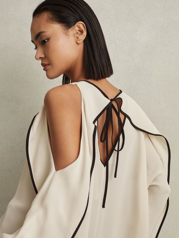 Ruffle Detail Cut Out Blouse in White (N72420) | US$97