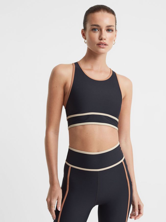 Soutien-gorge de sport à découpes avec dos nageur, noir The Upside (Q74455) | 63 €