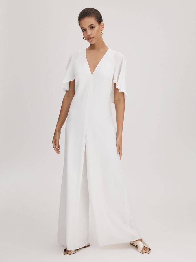 Florere Cape Wide Leg Jumpsuit in Ivory (Q83325) | US$114