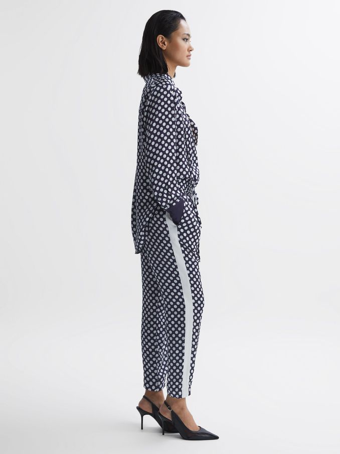 Polka Dot Drawstring Tapered Trousers in Navy/White (U31244) | US$84